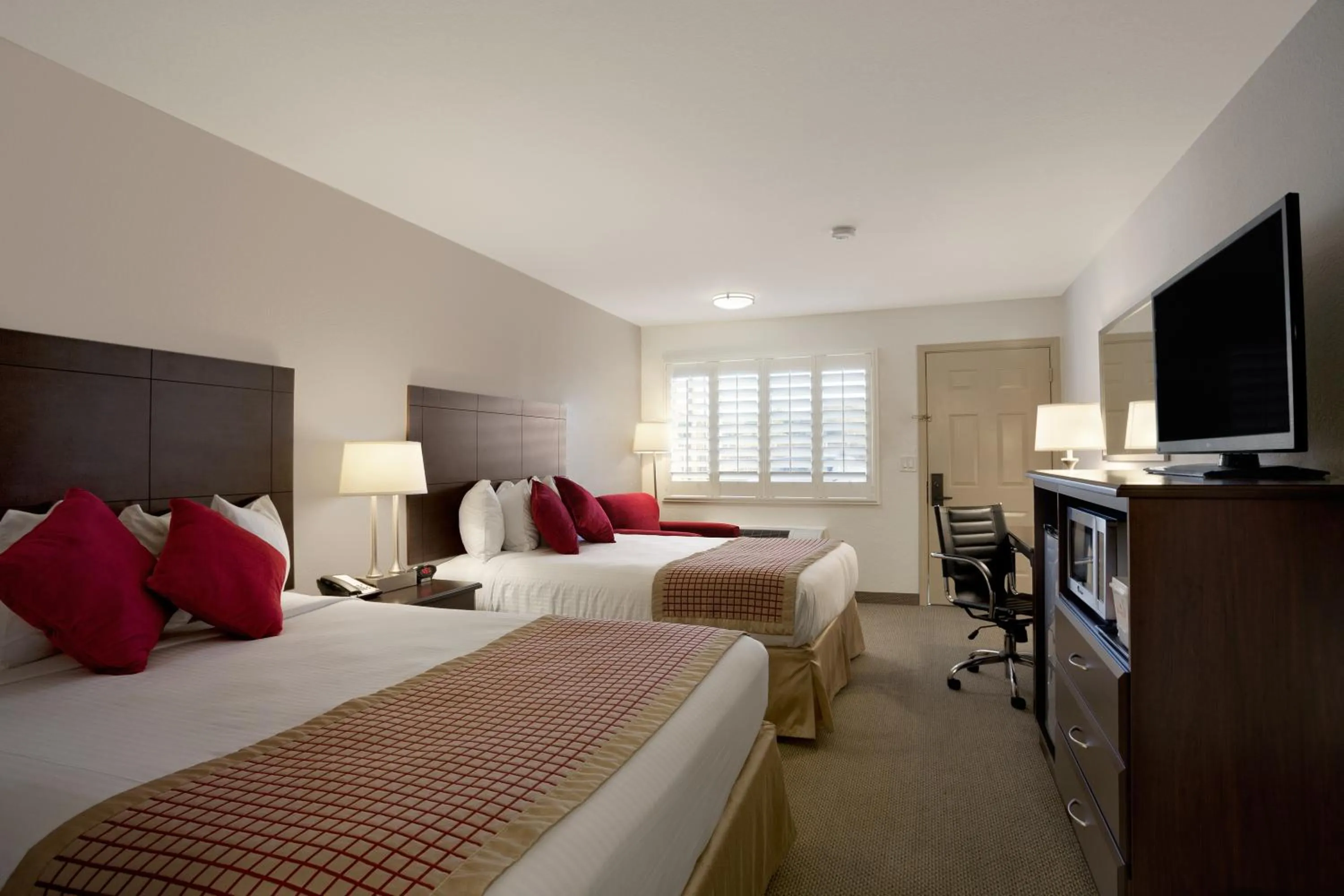 Deluxe Queen Room with Two Queen Beds - Non-Smoking in Infinity Inn & Suites