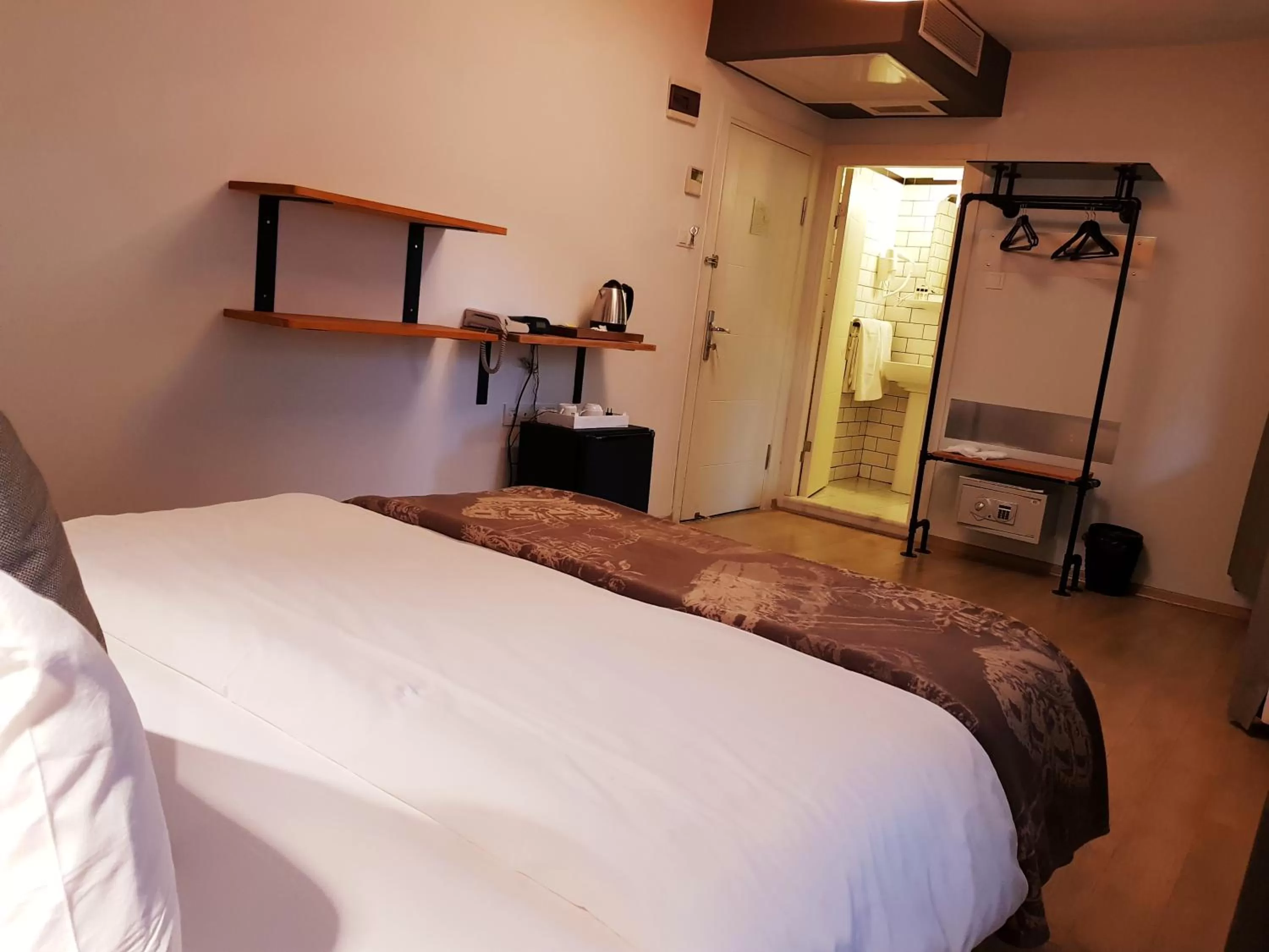 Bed in Rumours Inn