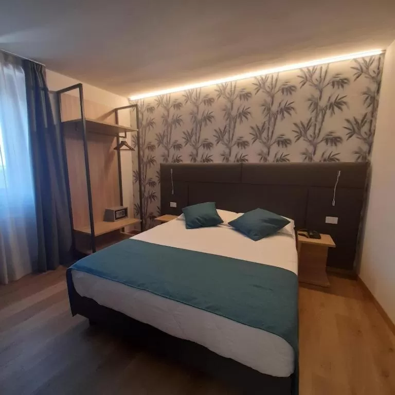 Superior Quadruple Room with Lake View in Bike Hotel Touring Gardone Riviera & Wellness