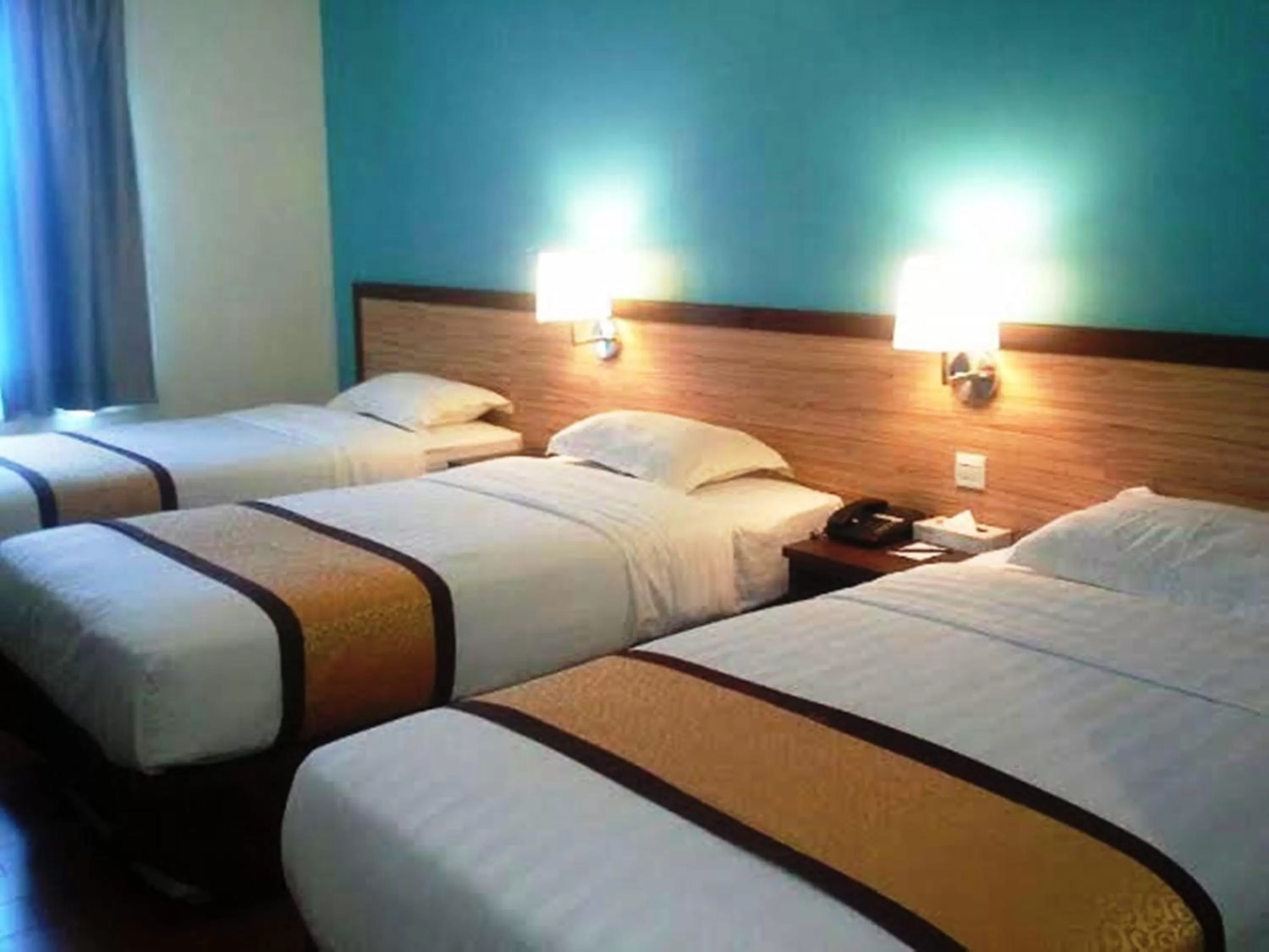 Deluxe Triple Room in TD Lodge Kota Belud