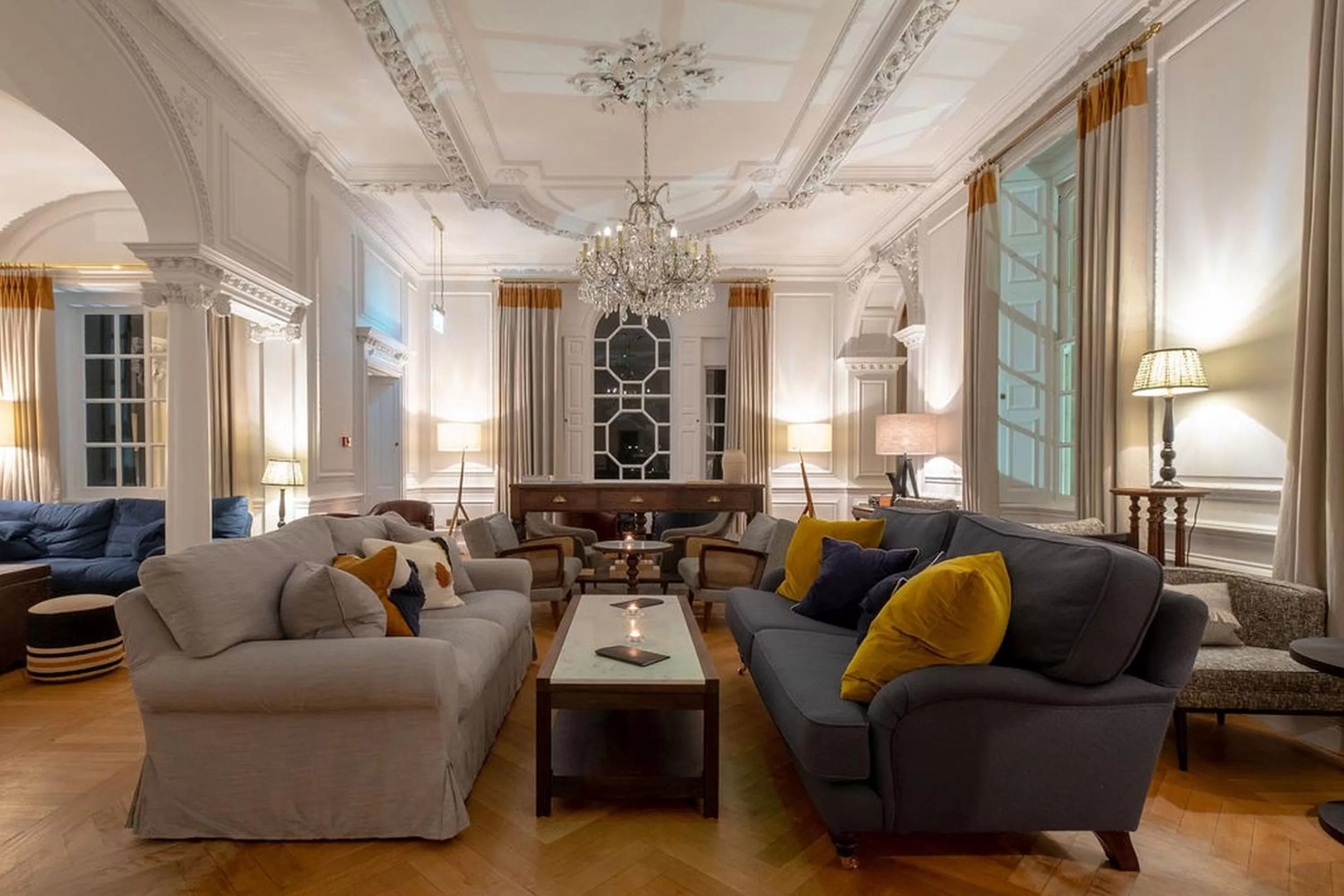 Communal lounge/ TV room in Fowey Hall Hotel