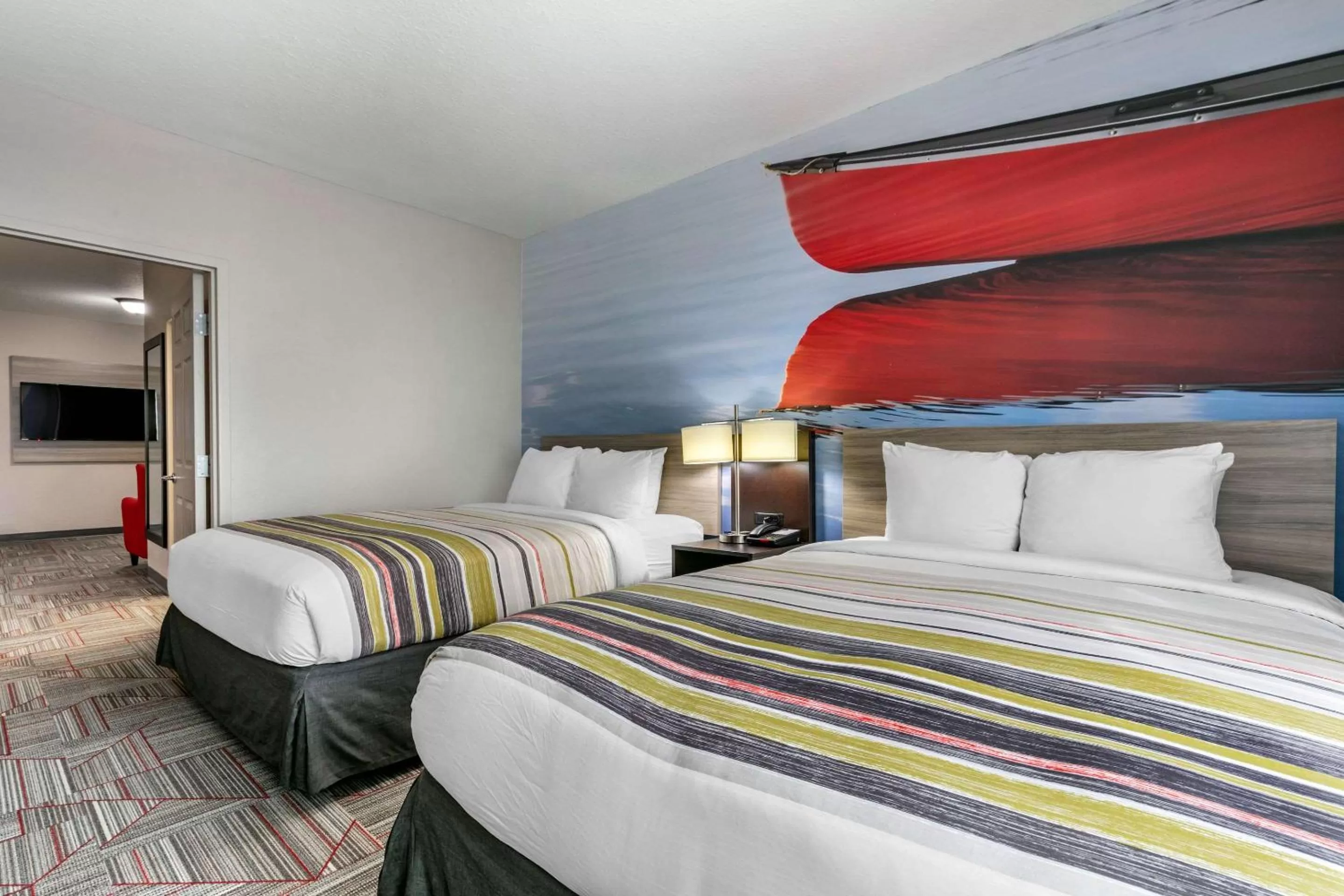 Queen Suite with Two Queen Beds and Sofa Bed - Non-Smoking in Clarion Pointe Columbus-Bradley Park