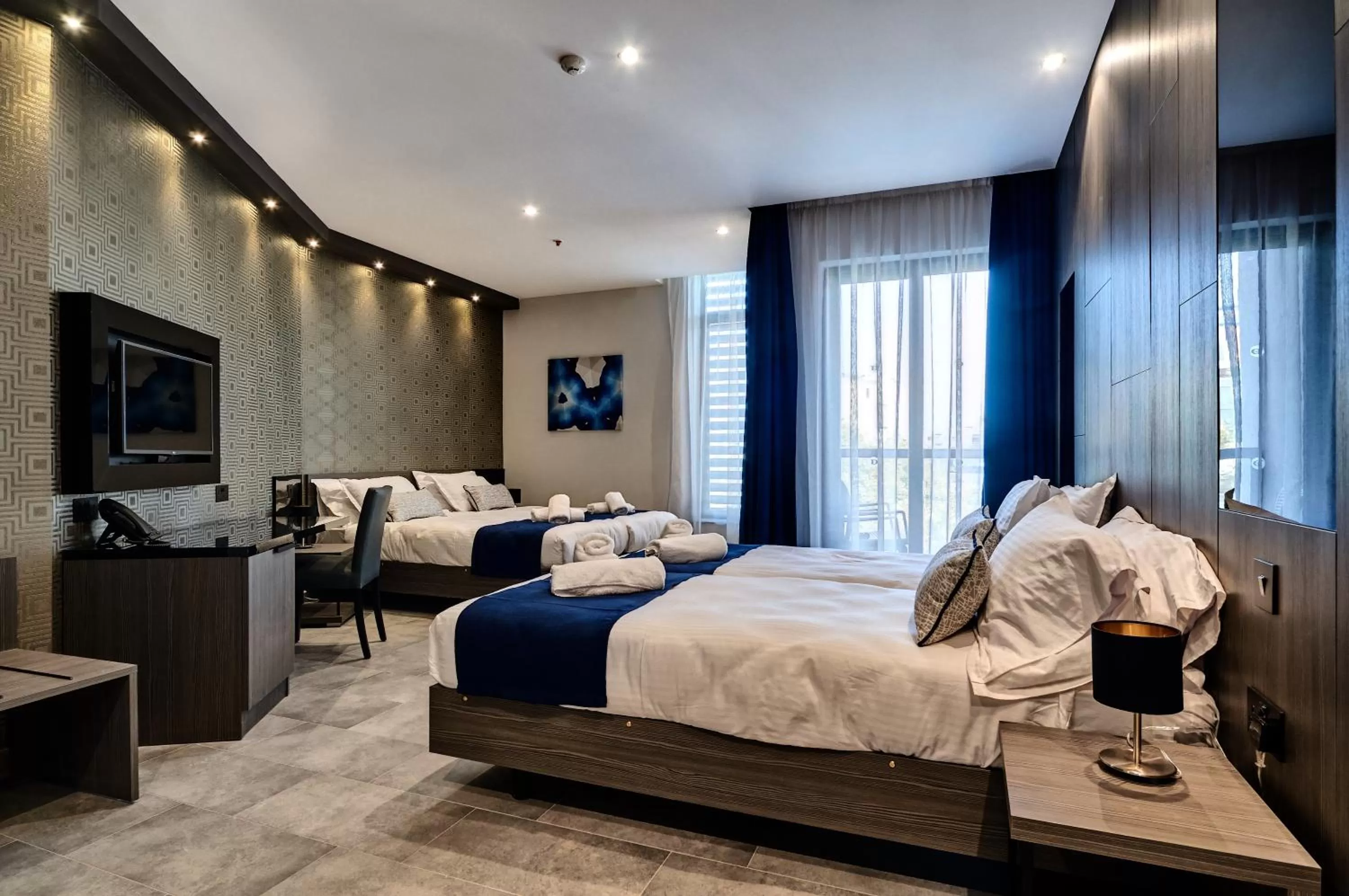 Superior Quadruple Room in The District Hotel