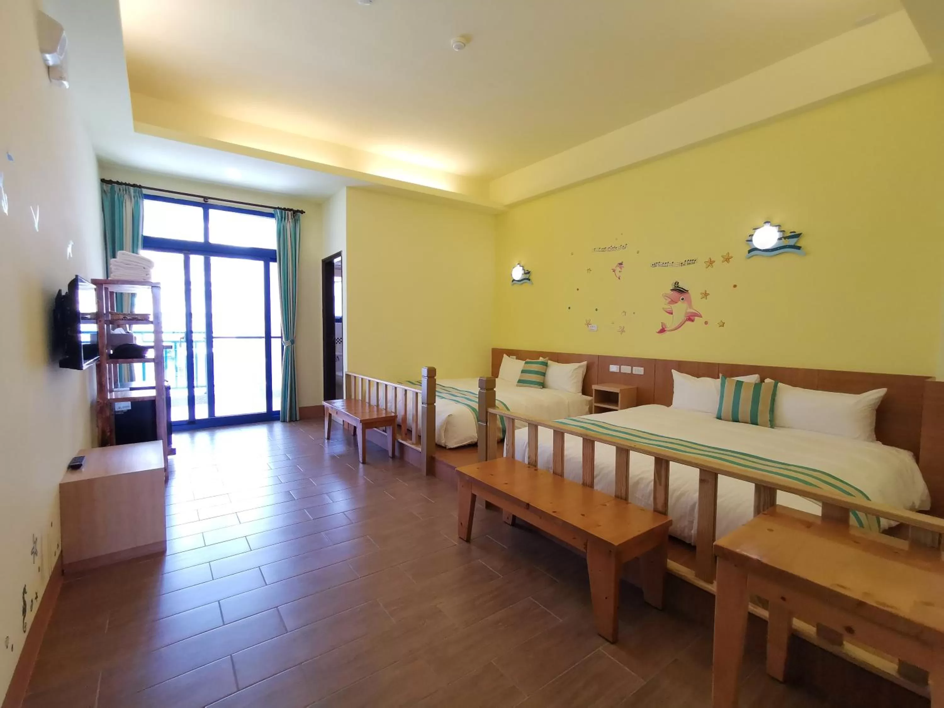 Quadruple Room with Private Bathroom in Love Ocean & Happy Bay HomeStay