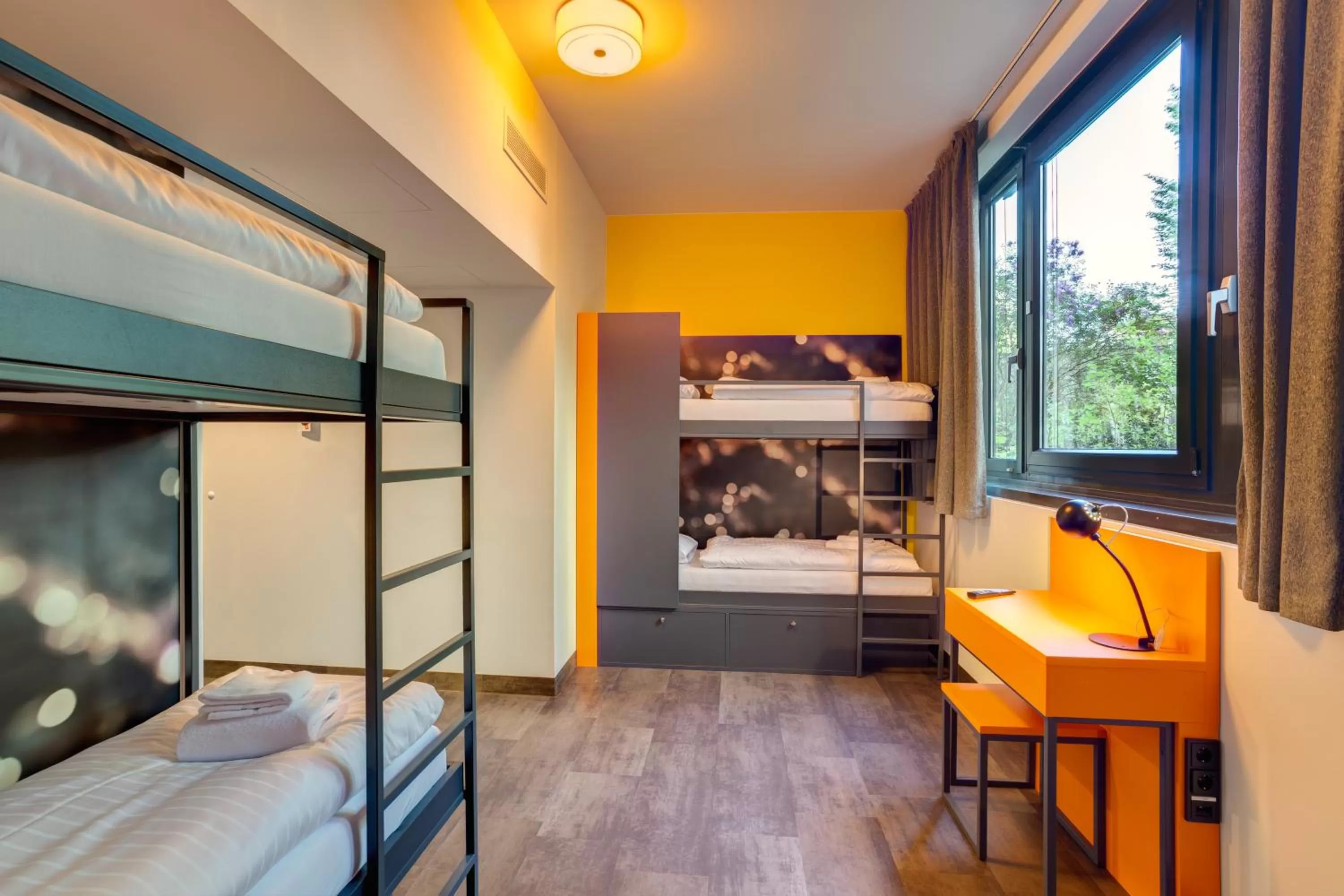 Bed in 6-Bed Mixed Dormitory Room in MEININGER Hotel München Olympiapark