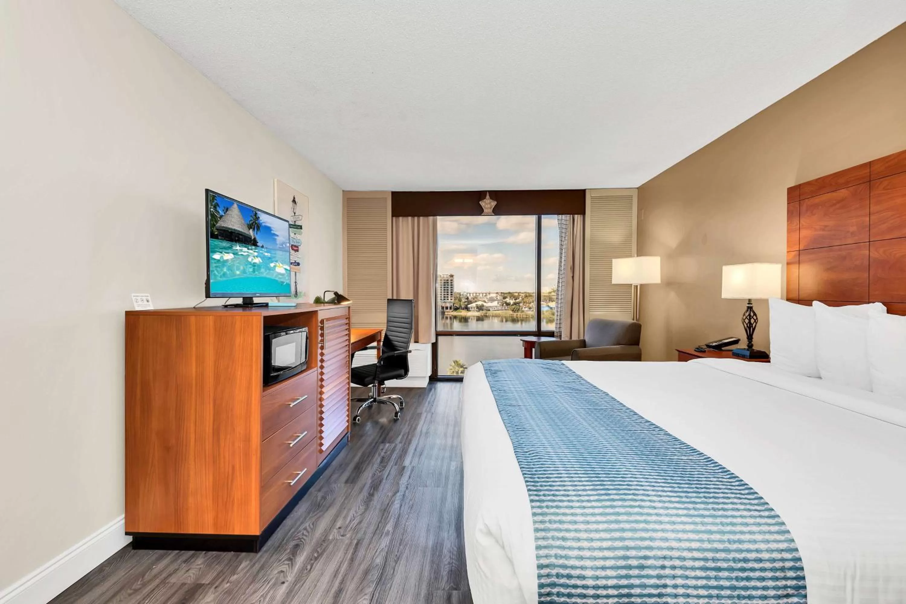 Premium Room 1 King Bed with a Water view in Best Western Orlando Gateway Hotel