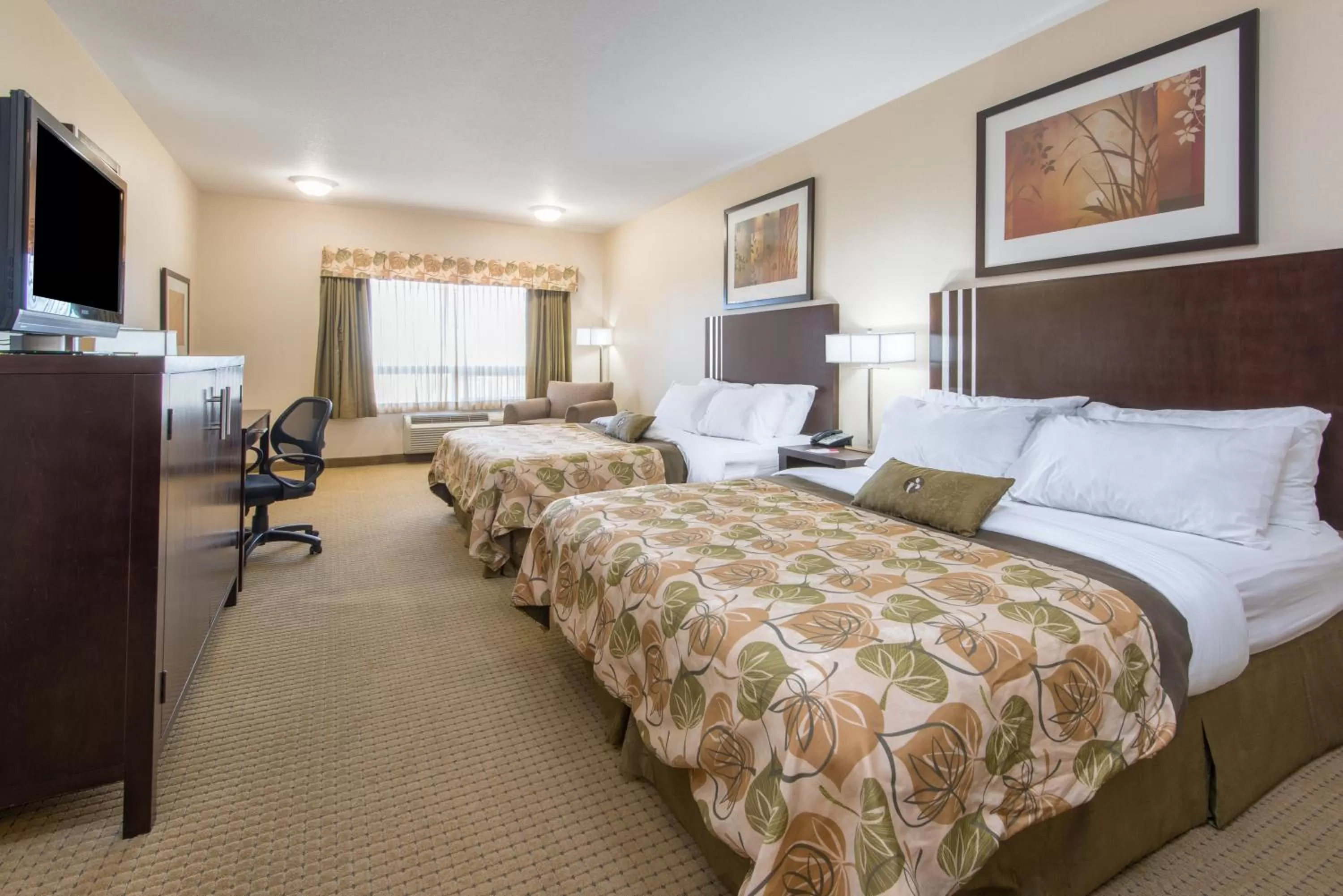 Efficiency Queen Room with Two Queen Beds - Non-Smoking in Ramada by Wyndham Wainwright