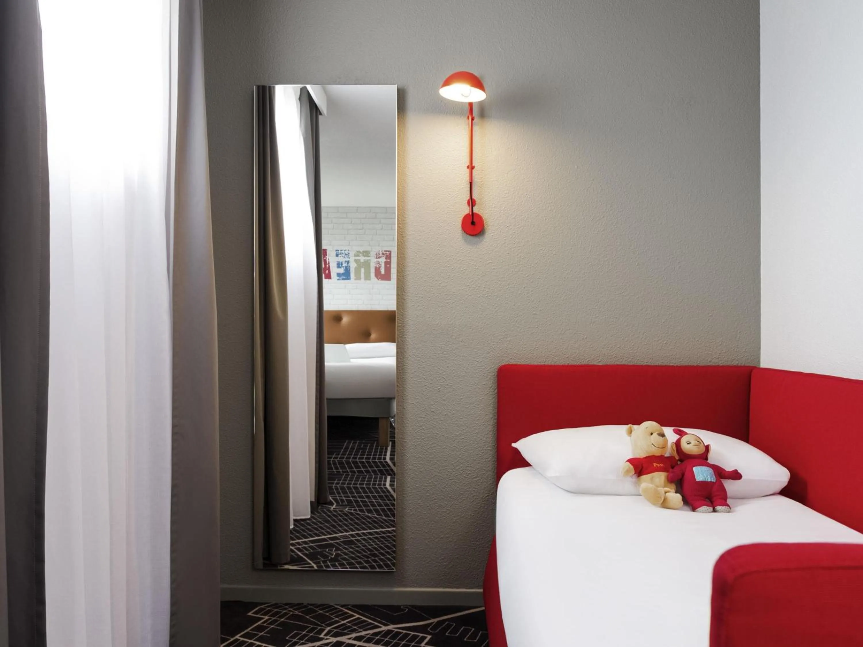 Family Room with One Double Bed and Two Single Beds in ibis Styles Chartres Métropole