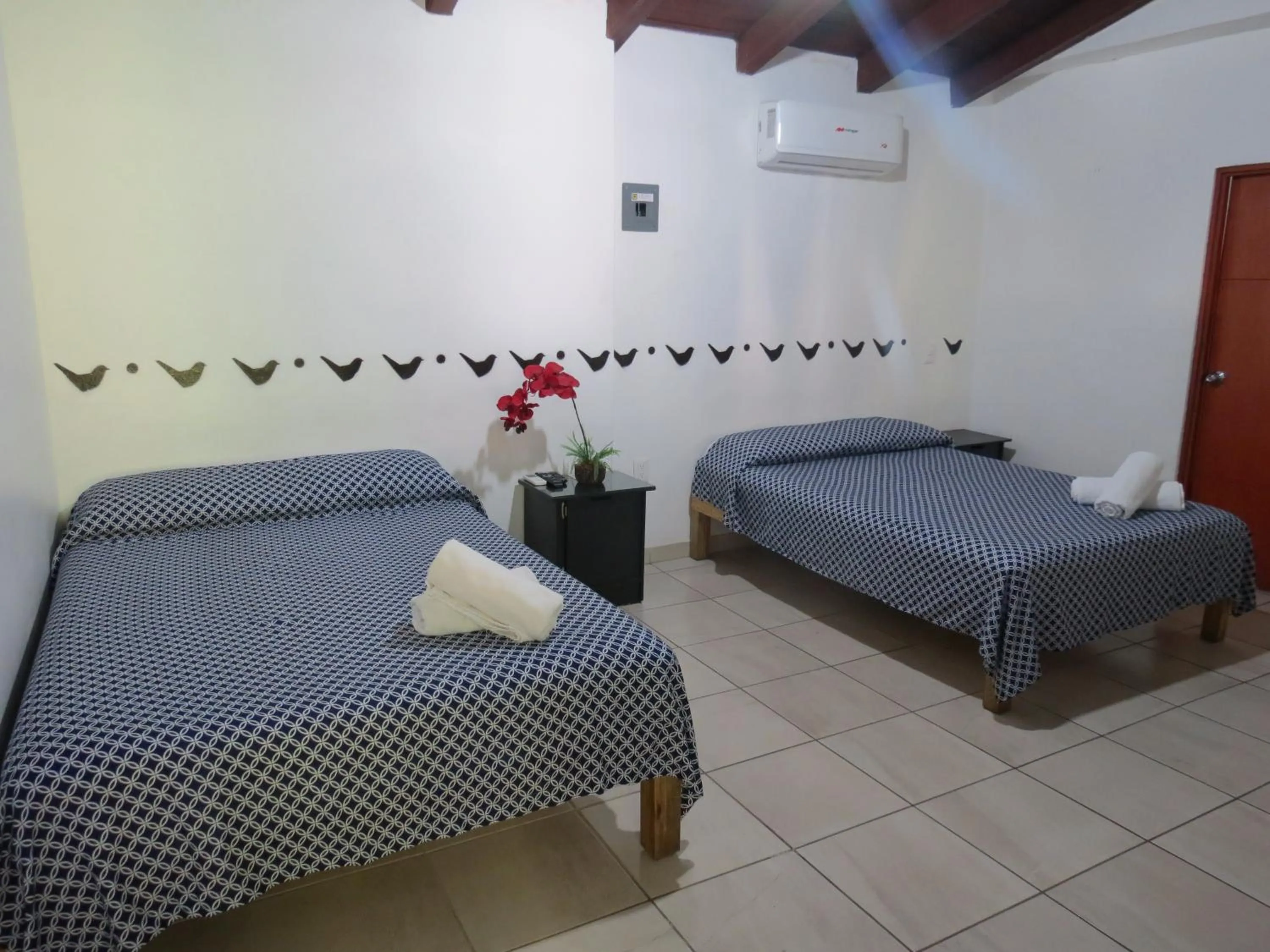 Standard Quadruple Room in Hotel Posada Comala