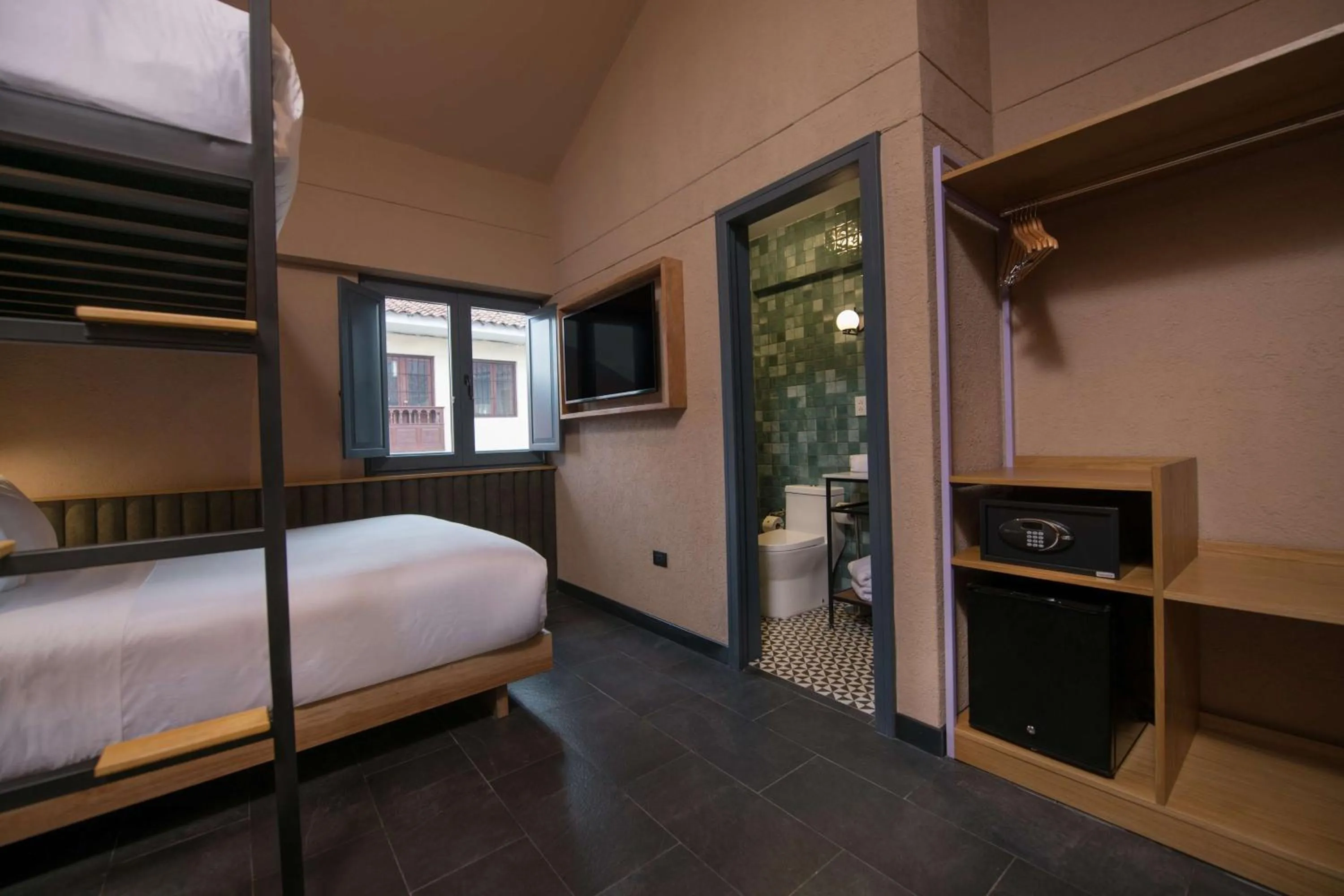 Room with Bunk Beds-One Twin Bed over One Queen Bed in Motto By Hilton Cusco