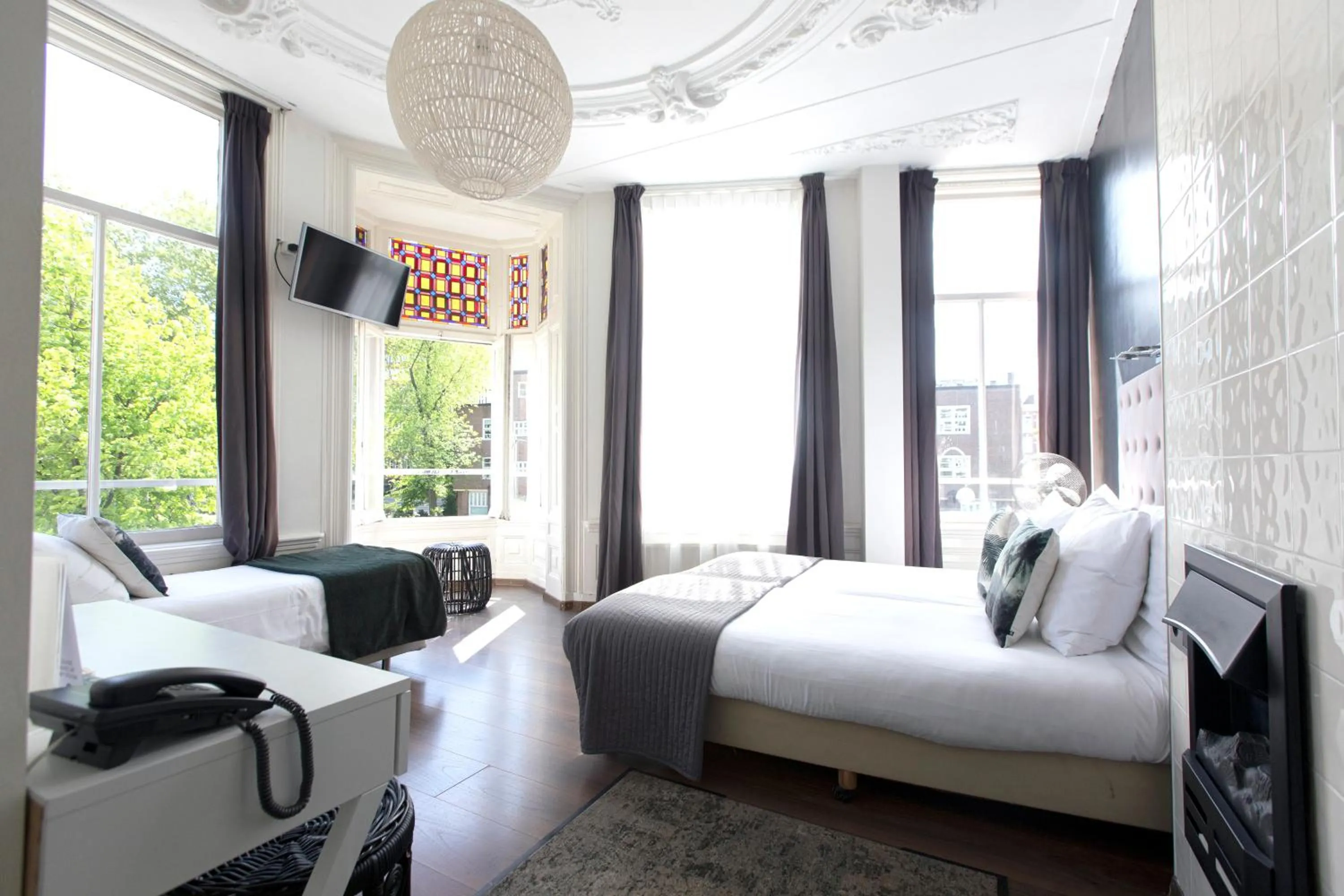 Triple Room with Canal View in Quentin Amsterdam Hotel