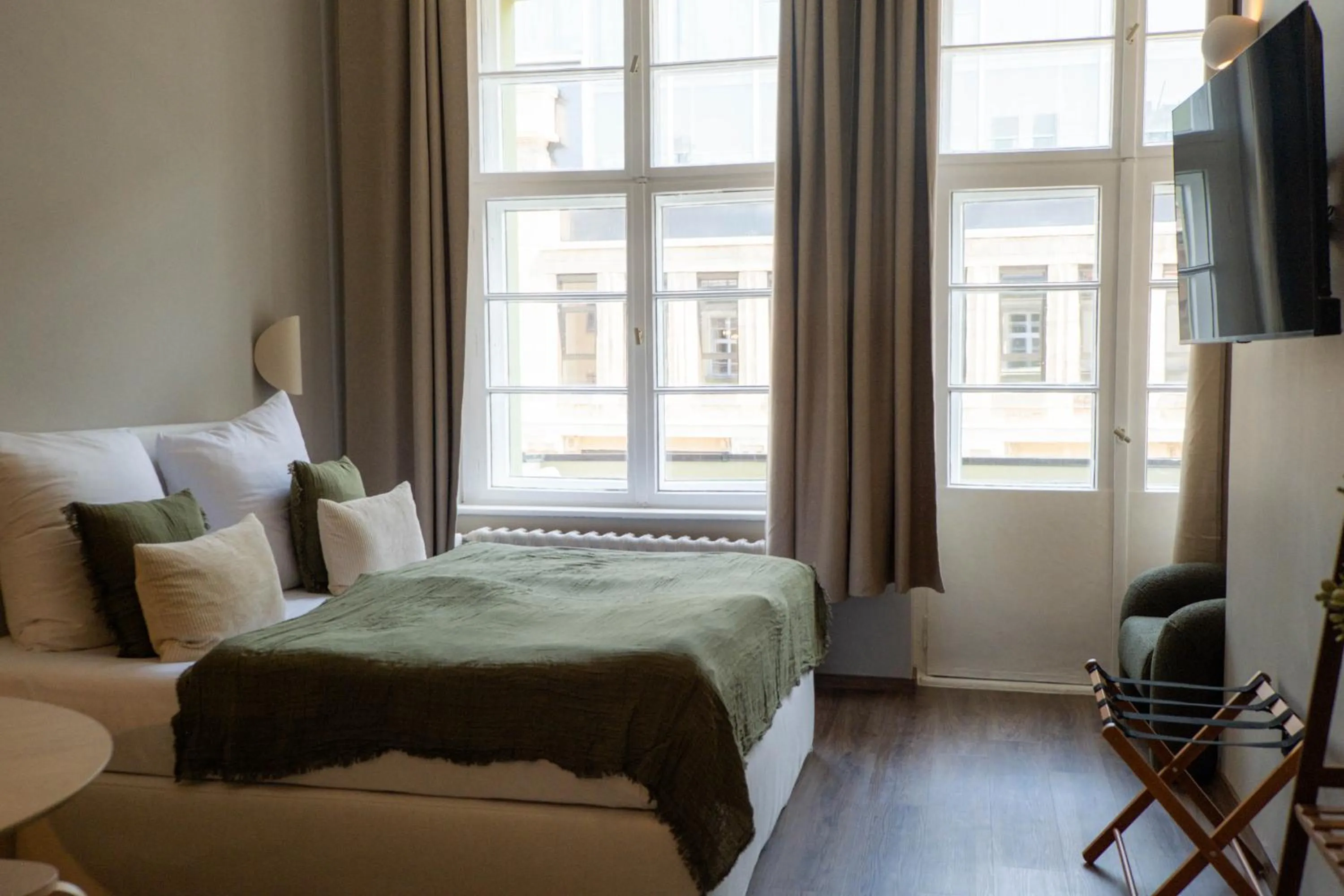 Quadruple Room with Balcony in The Charming by Curt Suites