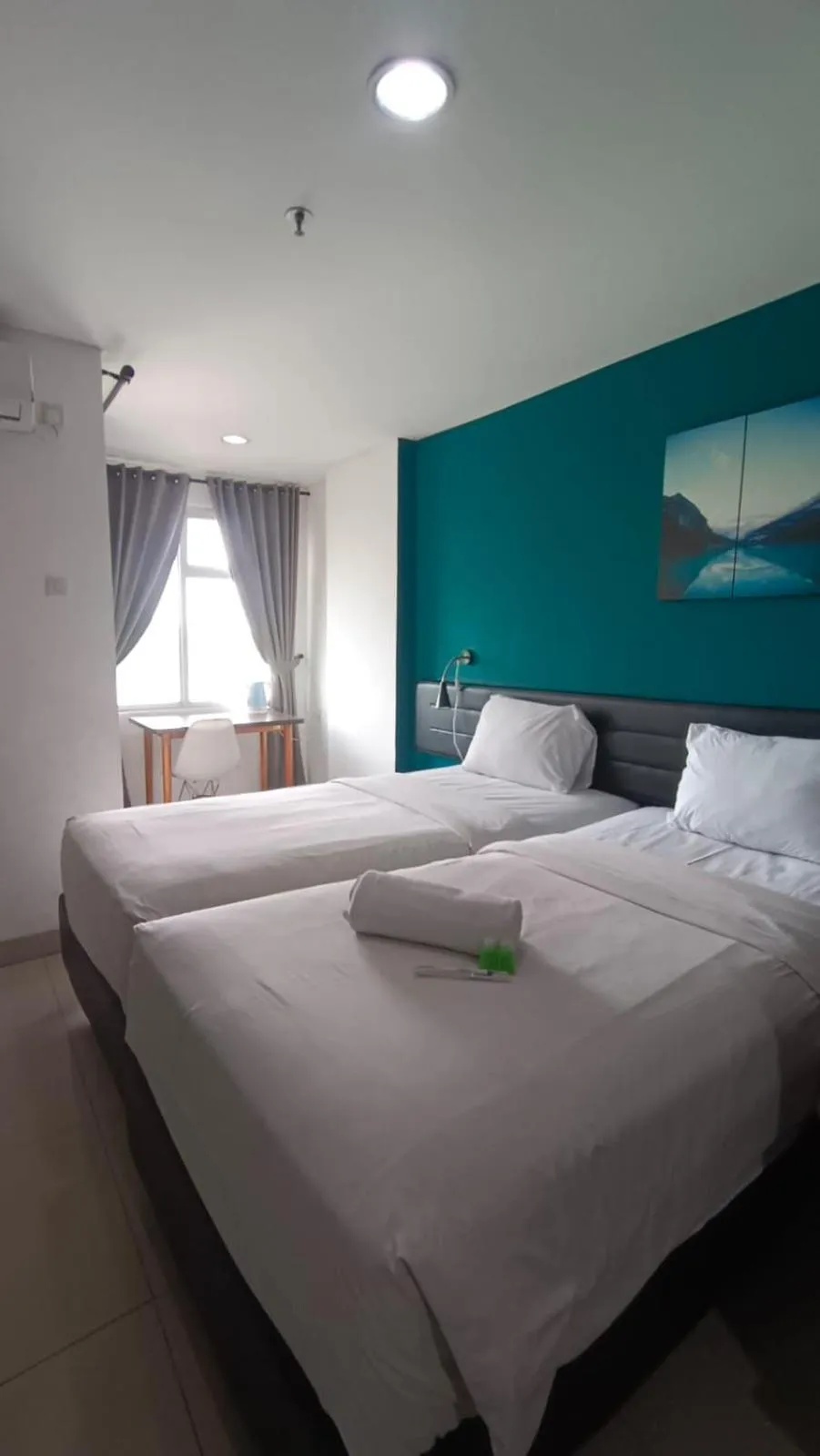 Standard Twin Room in Izi Cozi Jababeka Enviro Powered by Archipelago