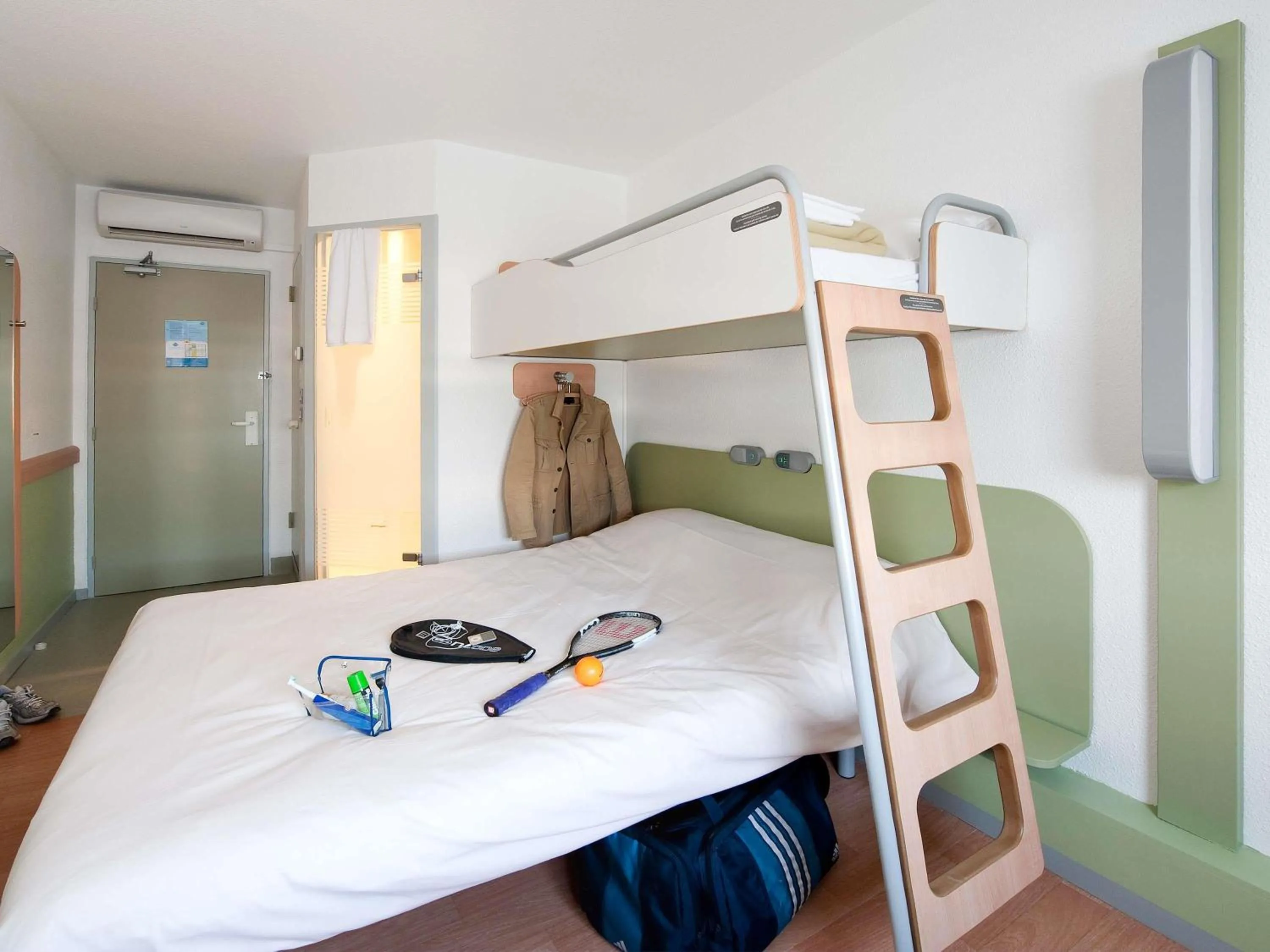 Triple Room with One Double Bed and One Bunk Bed in ibis budget Poitiers Sud