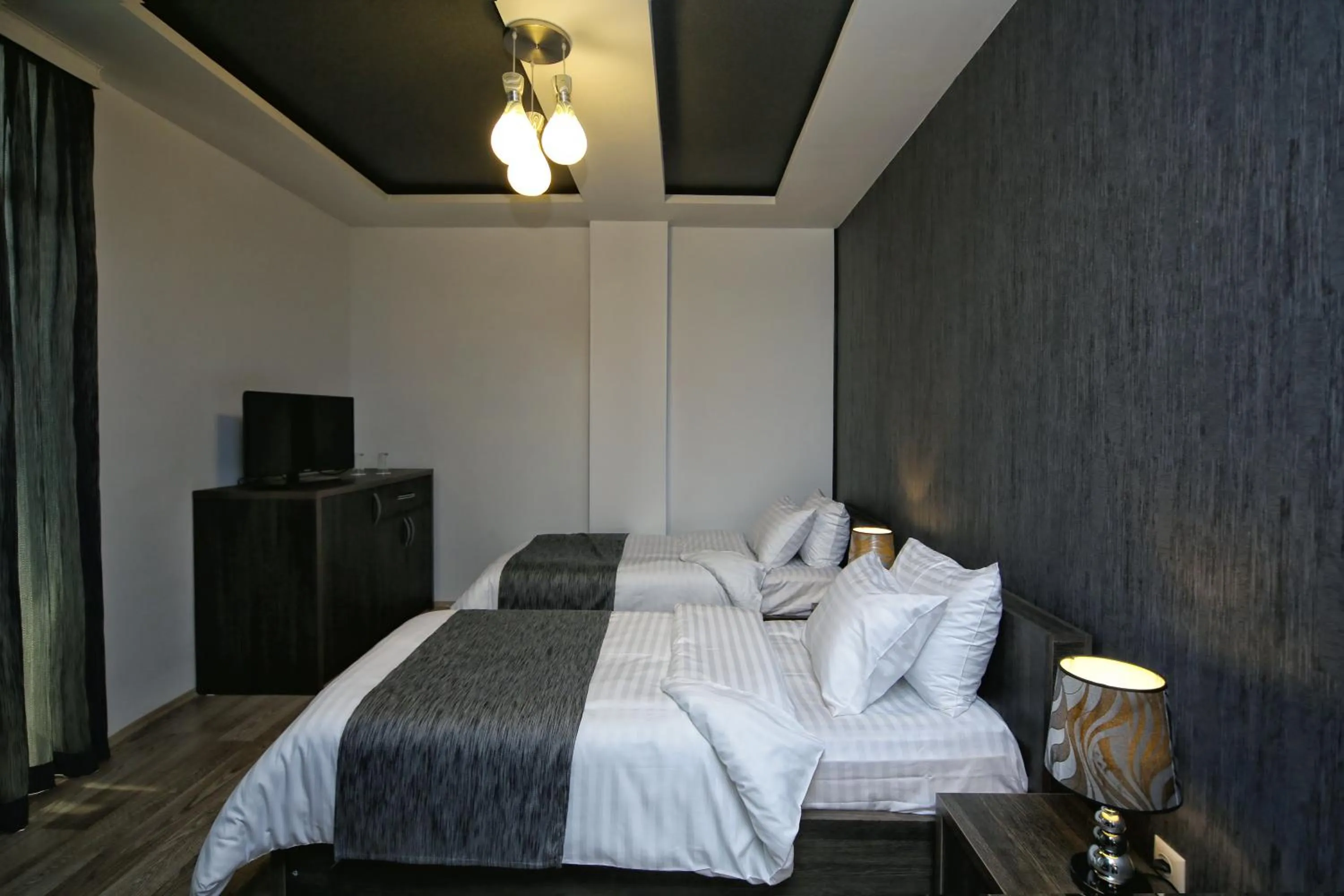 Twin Room with Balcony - single occupancy in Continental Hotel