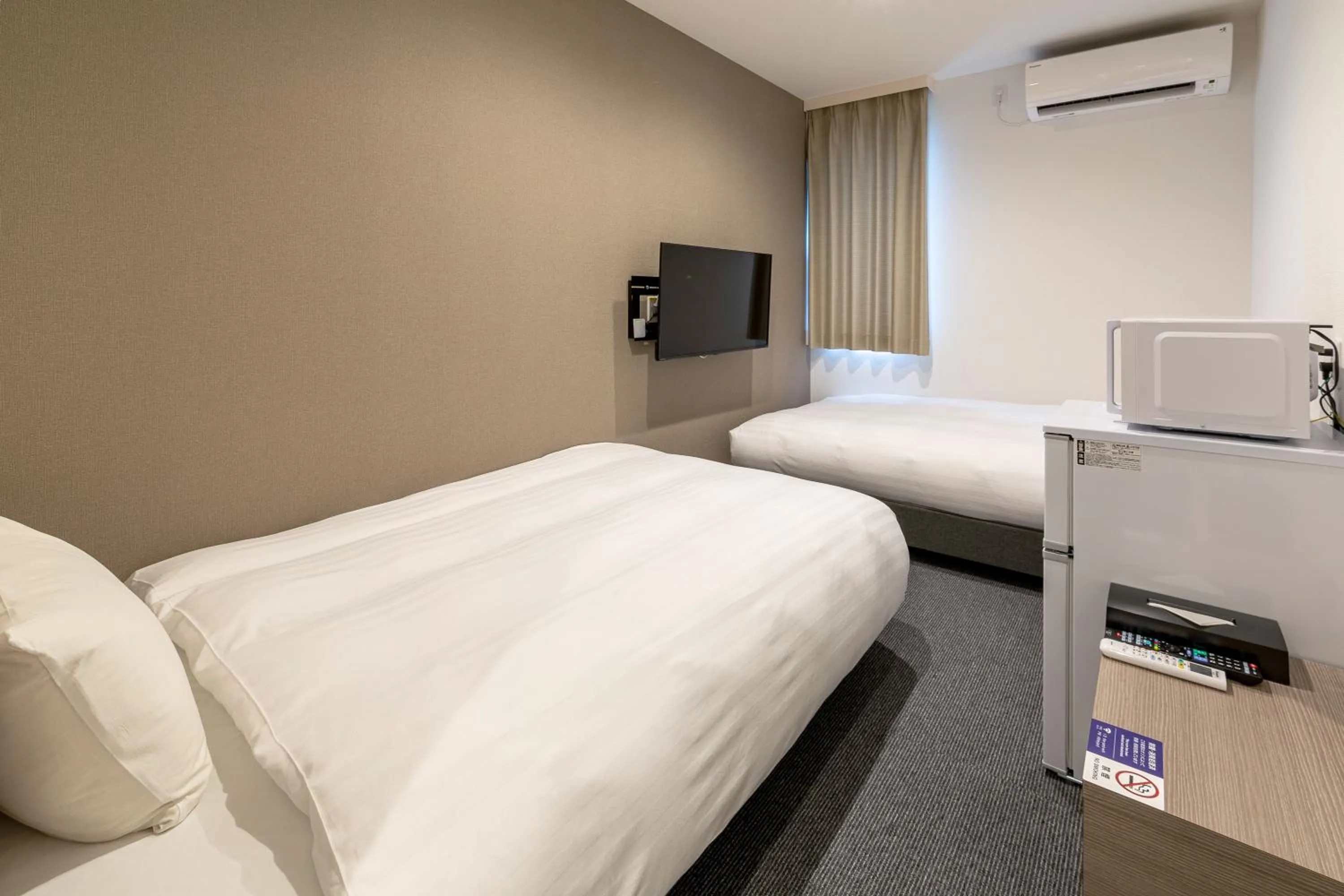 Standard Twin Room - single occupancy in HOTEL R9 The Yard Nakama
