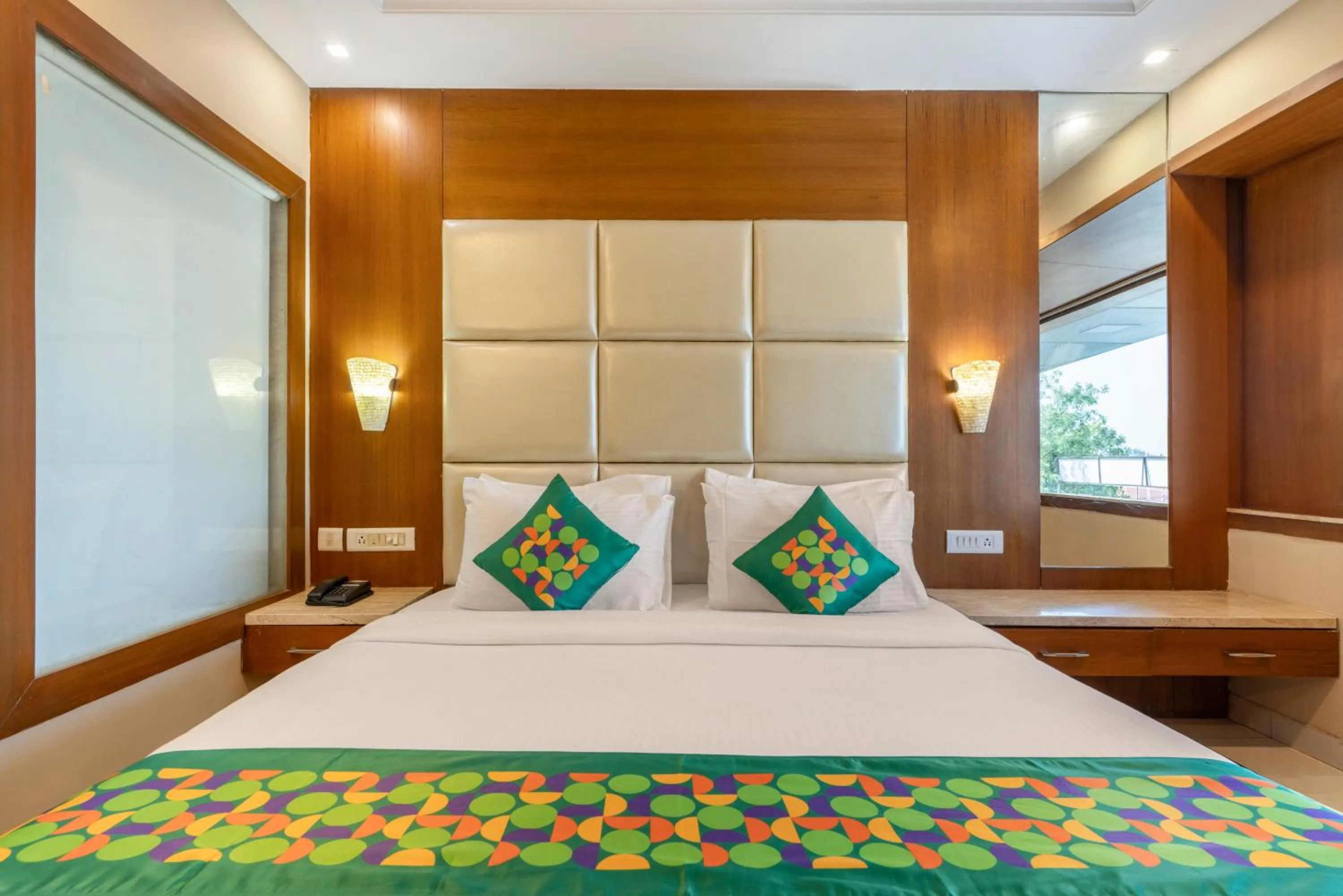 Deluxe Room - single occupancy in Treebo Premium Vinnie - Near Airport