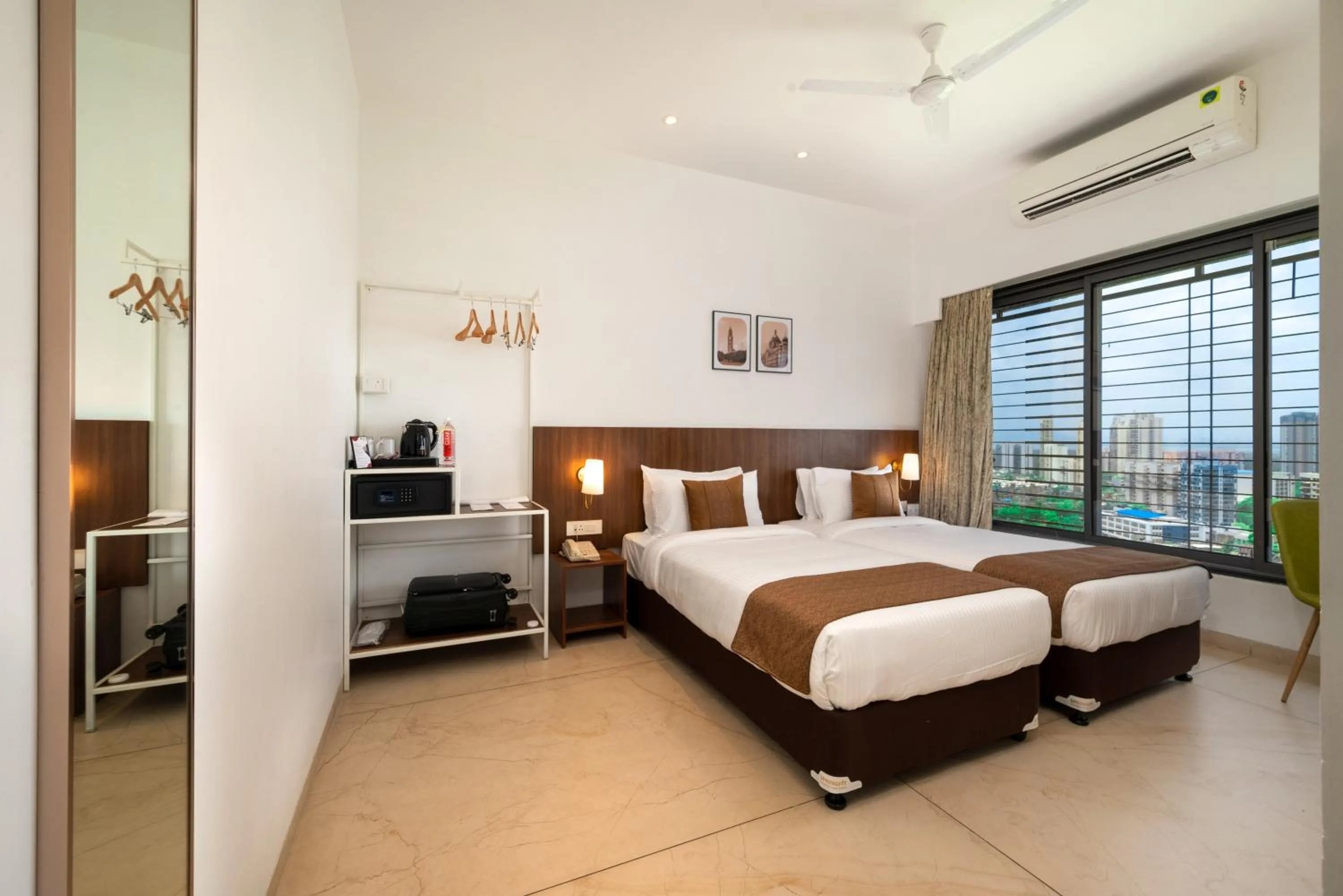 Deluxe Twin Room - single occupancy in Freesia Residency By Express Inn - Navi Mumbai