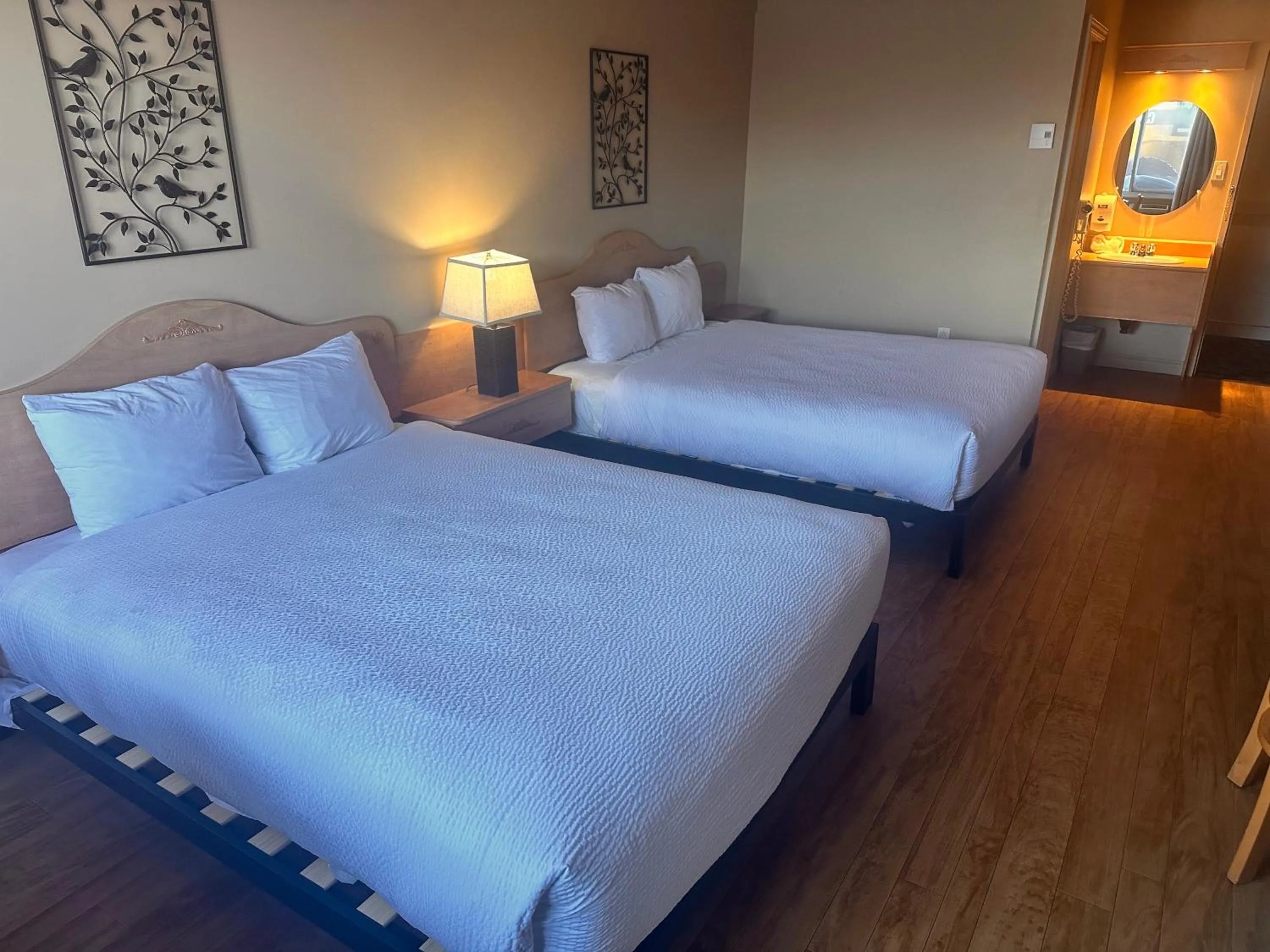 Deluxe Queen Room with Two Queen Beds - Non-Smoking in Travelodge by Wyndham Drummondville