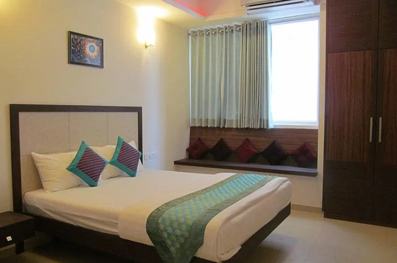 Bed in Ixora Suites