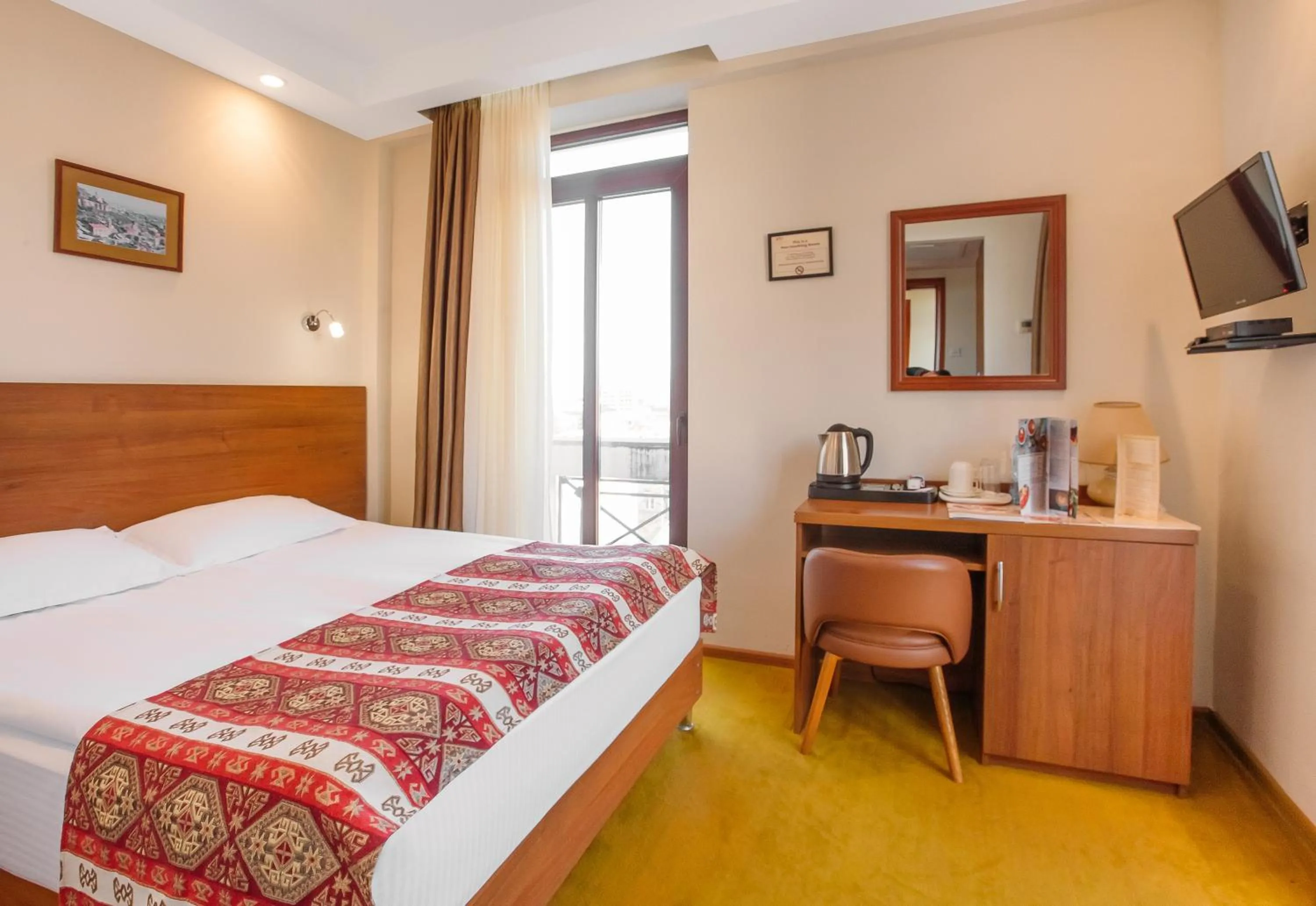 Economy Double Room with Balcony - single occupancy in Urban Boutique Hotel
