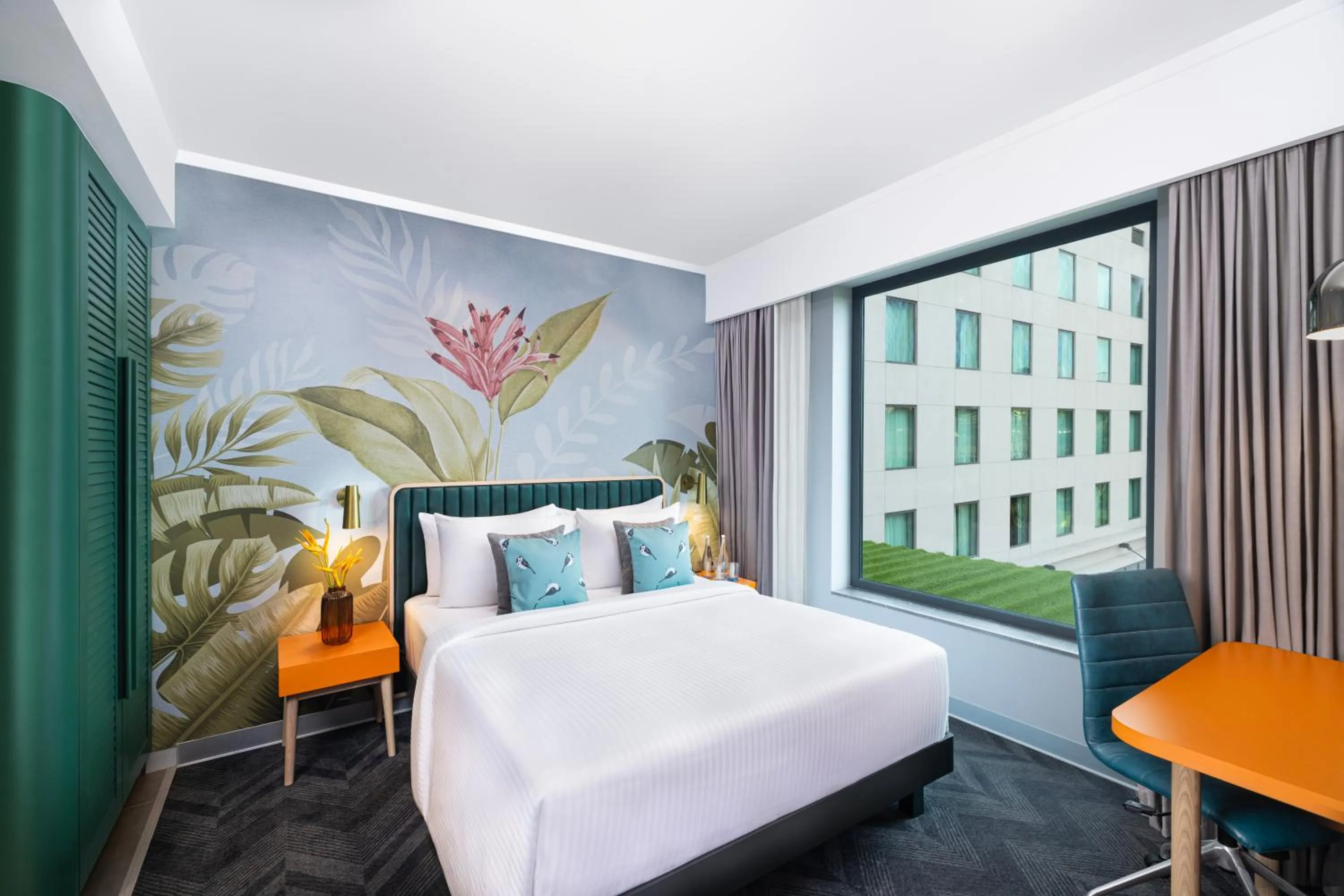 Deluxe Suite One Queen bed in ibis Styles Mysuru