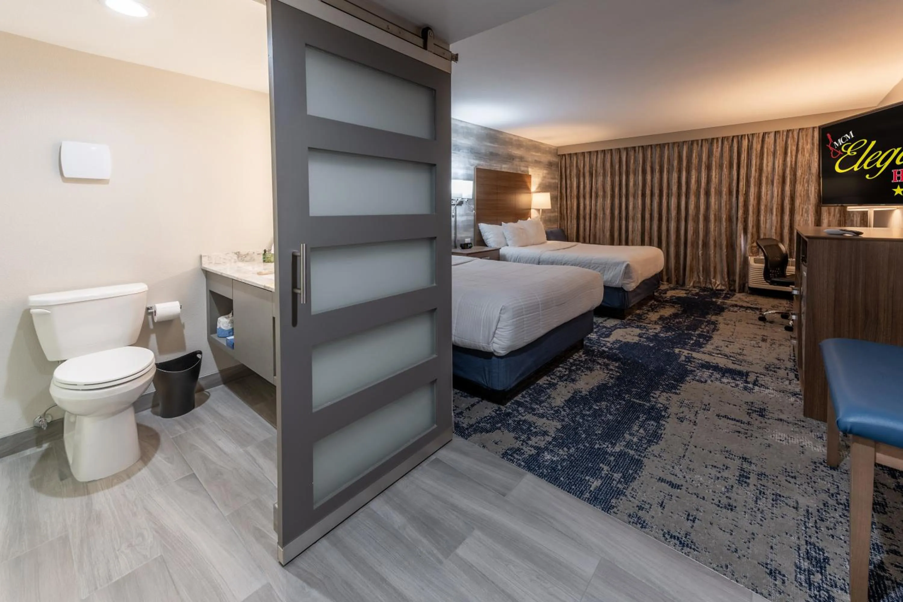 Superior Queen Room with Two Queen Beds in MCM Elegante Hotel