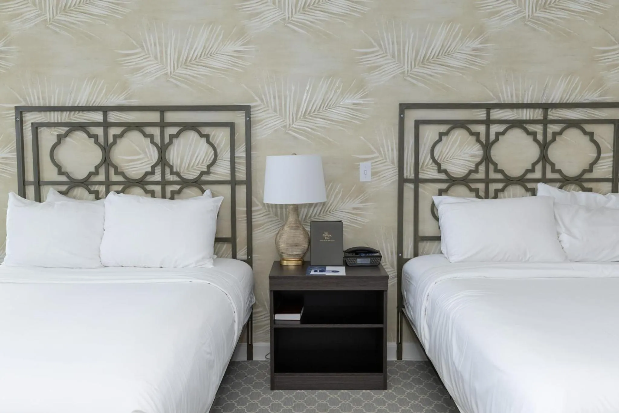 Room with Two Double Beds with Balcony and Lake View in The Geneva Inn