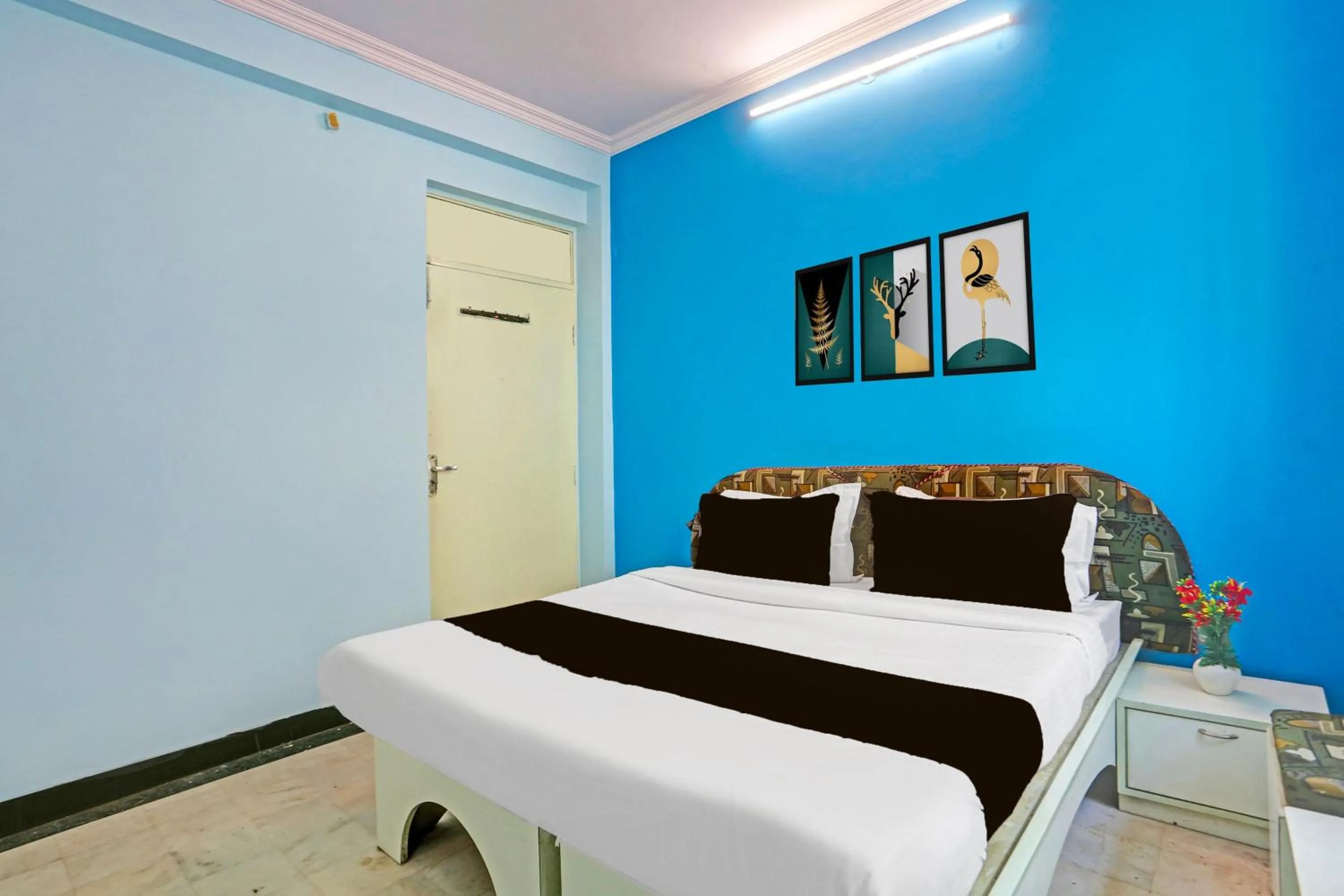 Classic Triple Room - single occupancy in Super Collection O Bani Park Near Collectorate Circle Formerly Anuja Palace