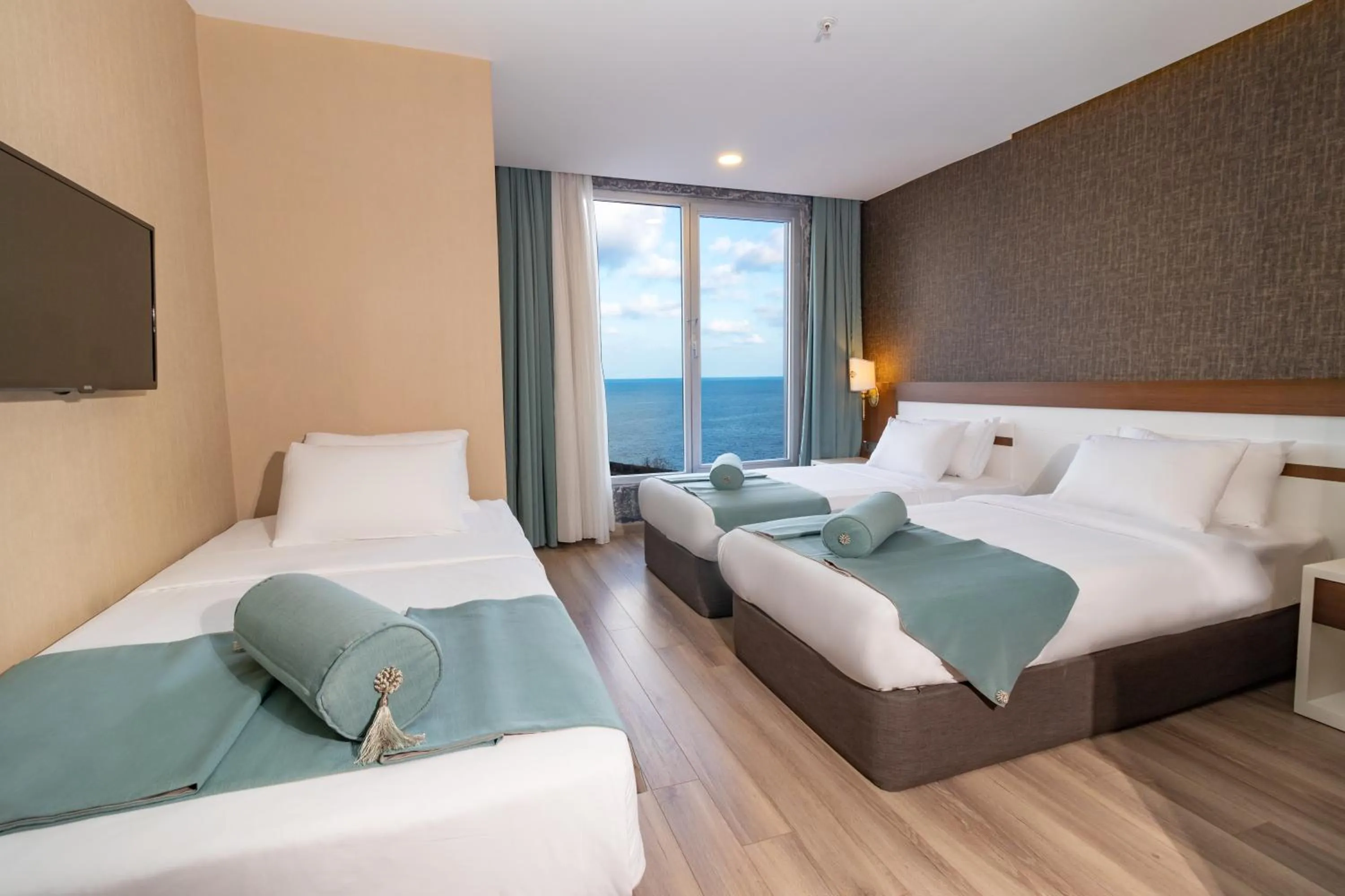 Deluxe Triple Room with Sea View in Tilya Resort Hotel