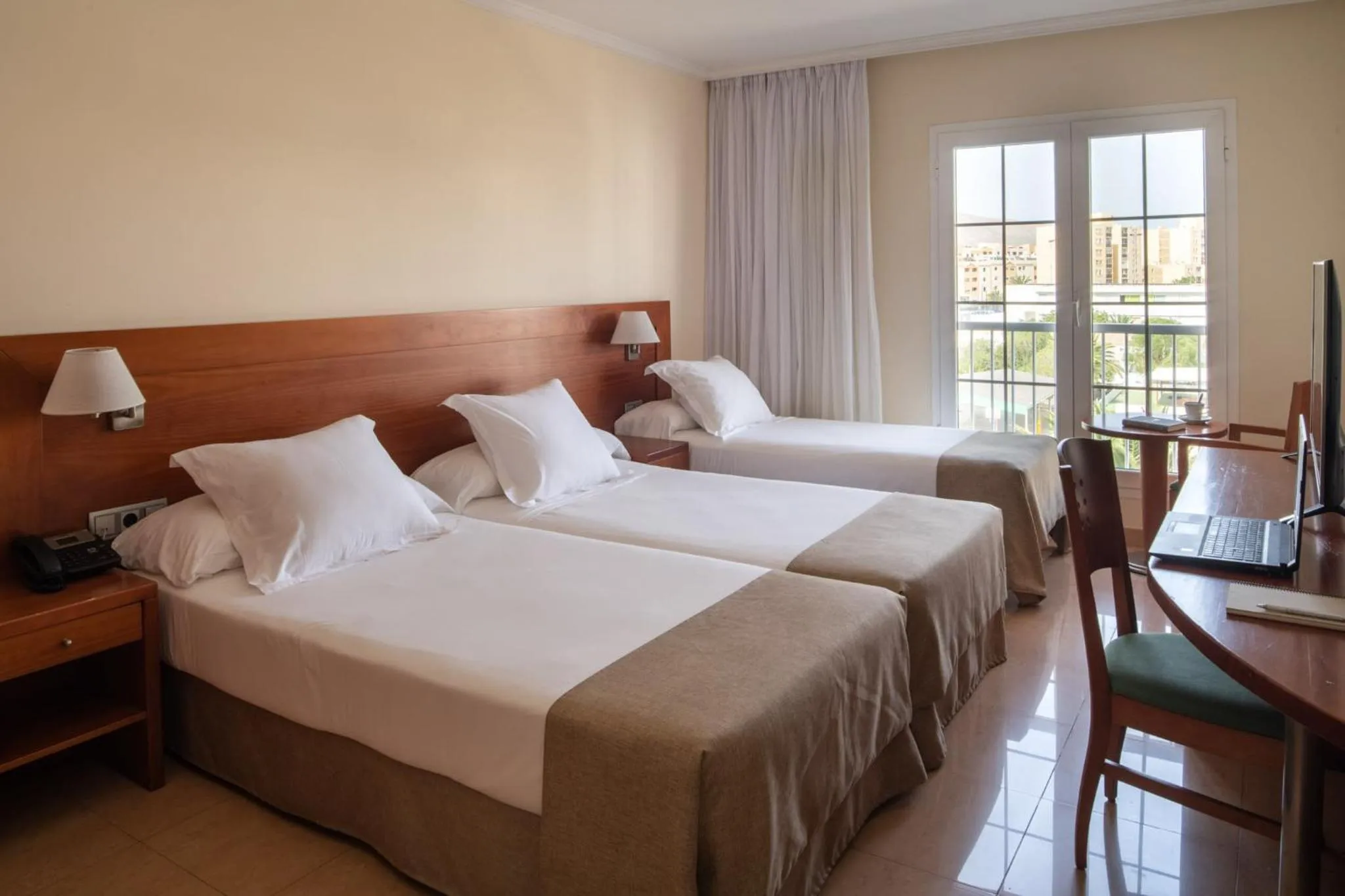 Standard Triple Room in Checkin Diamar