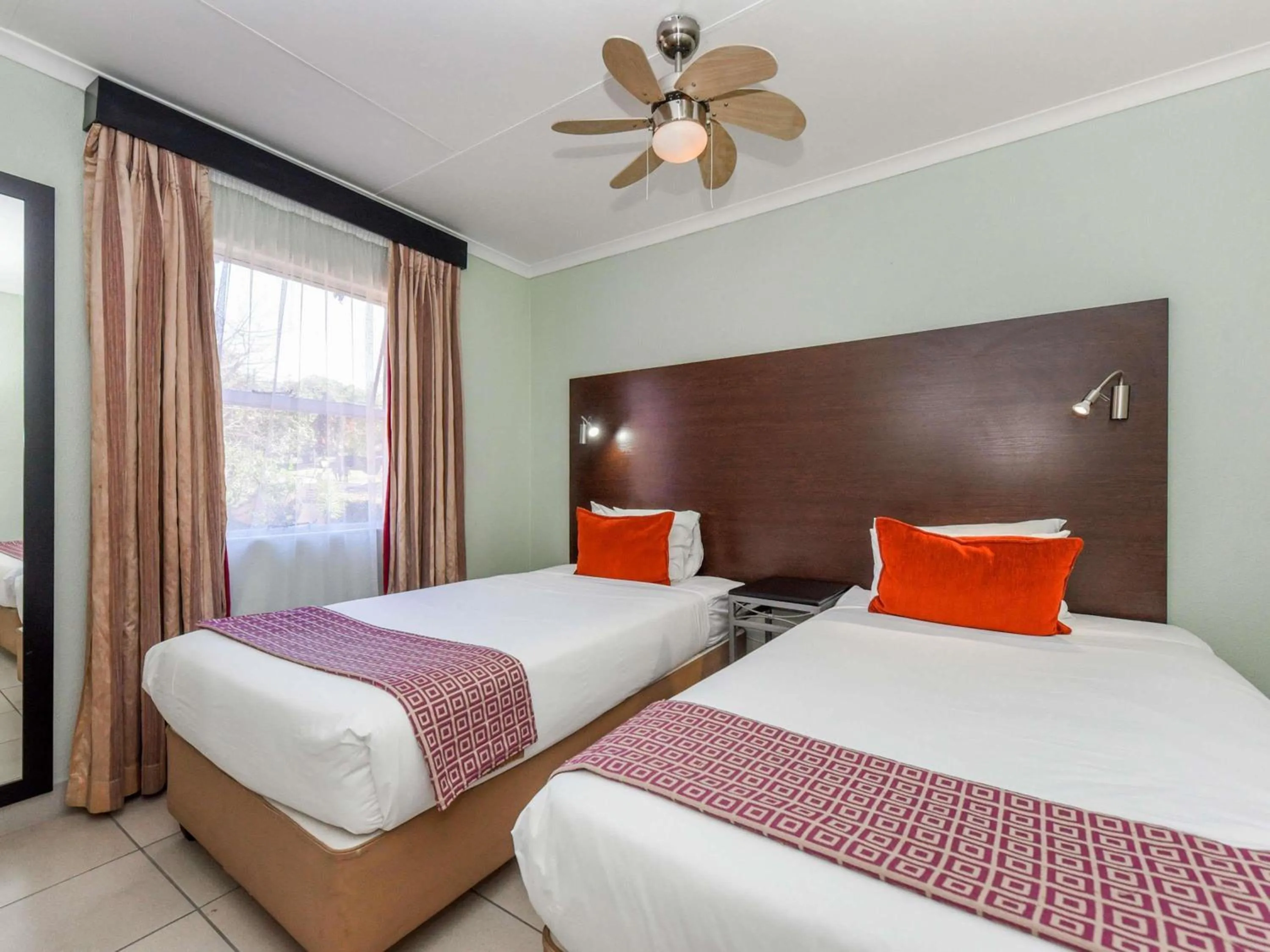 Superior Room with One Double and Two Single Beds in Mercure Hotel Nelspruit