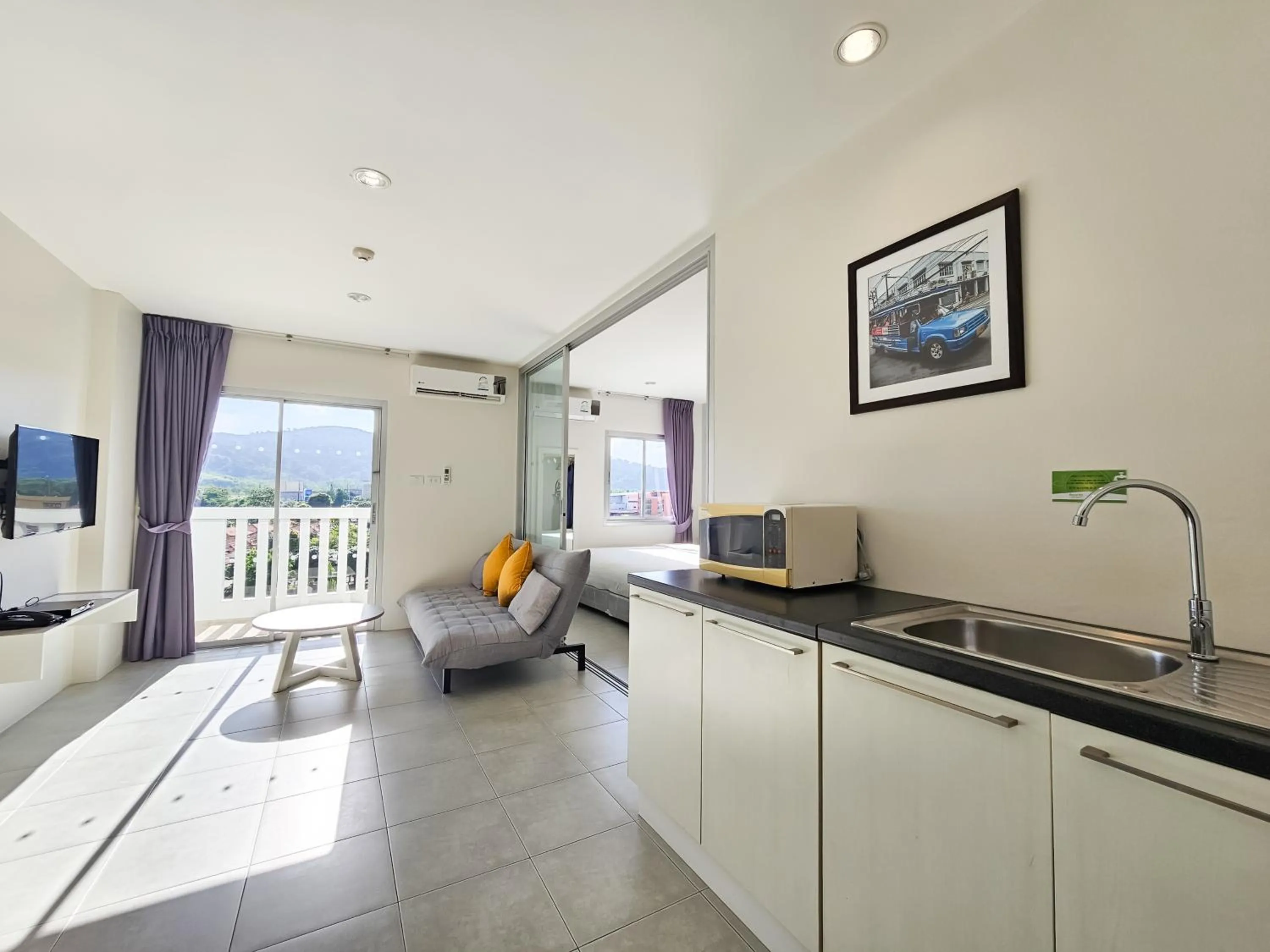 Deluxe Family Room in Recenta Suite Phuket Suanluang