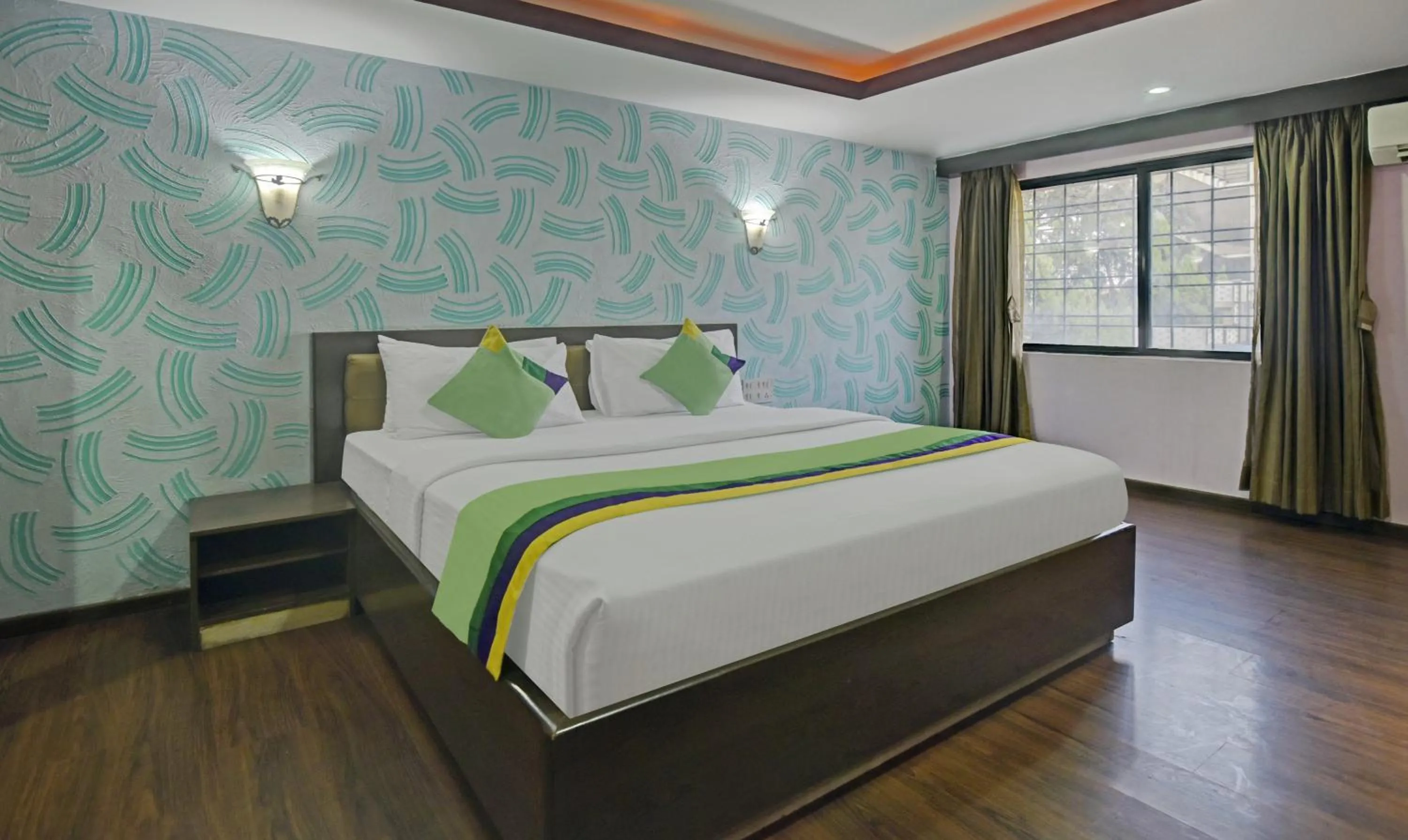 Deluxe Double Room - single occupancy in Treebo Savoury Sea Shell Residency