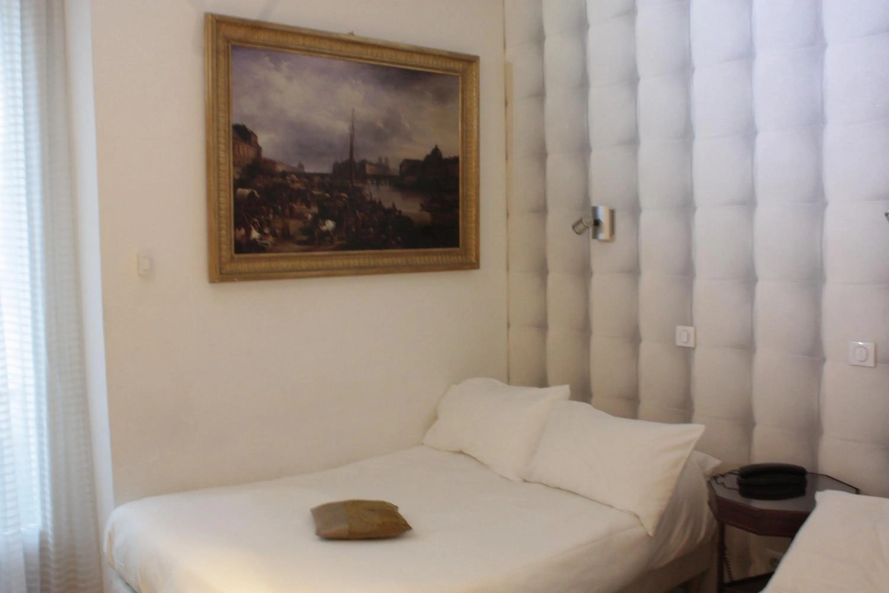 Quadruple Room in Hotel Hauteville Opera