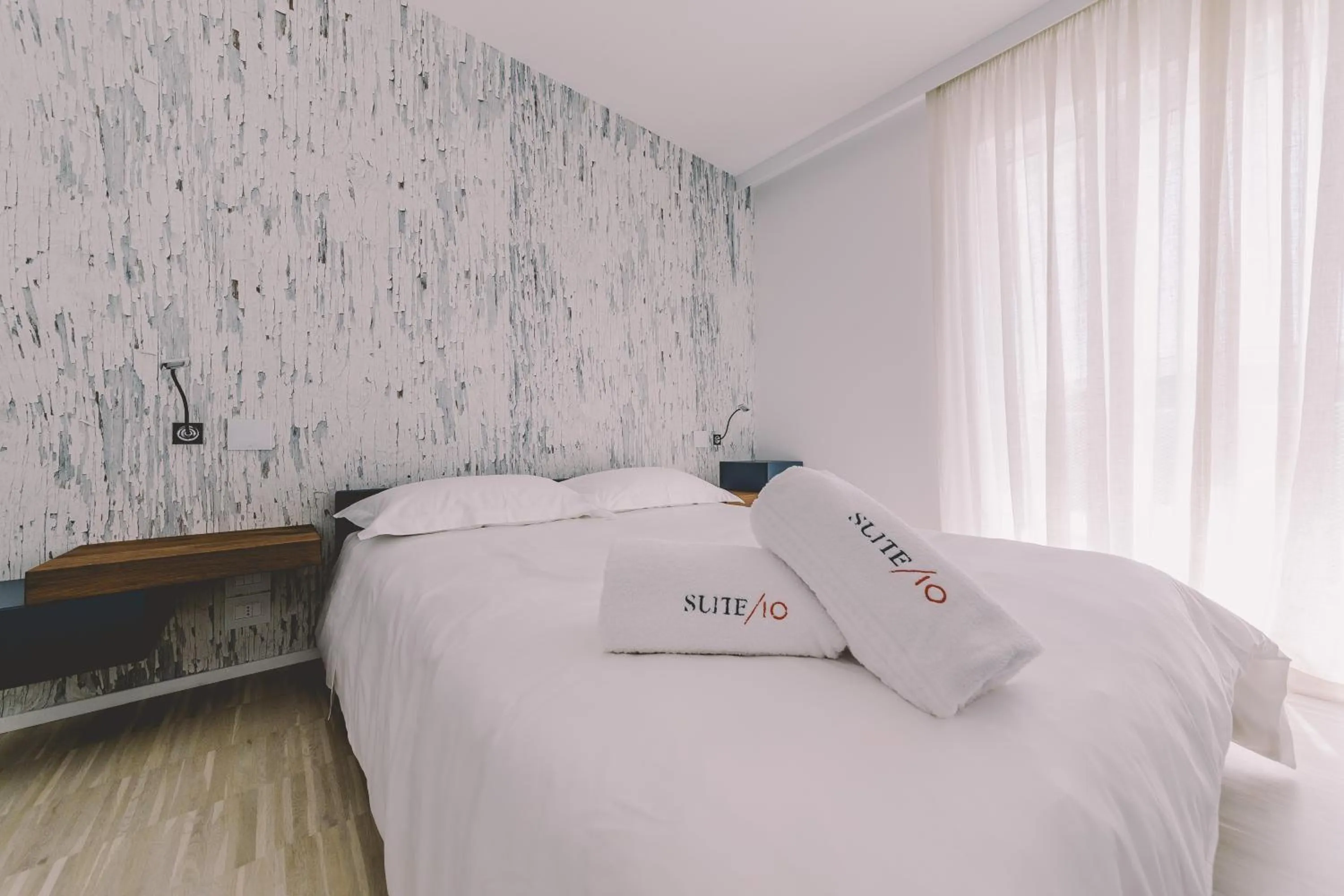 One-Bedroom Suite with Balcony in Suite 10 Home Design & Spa