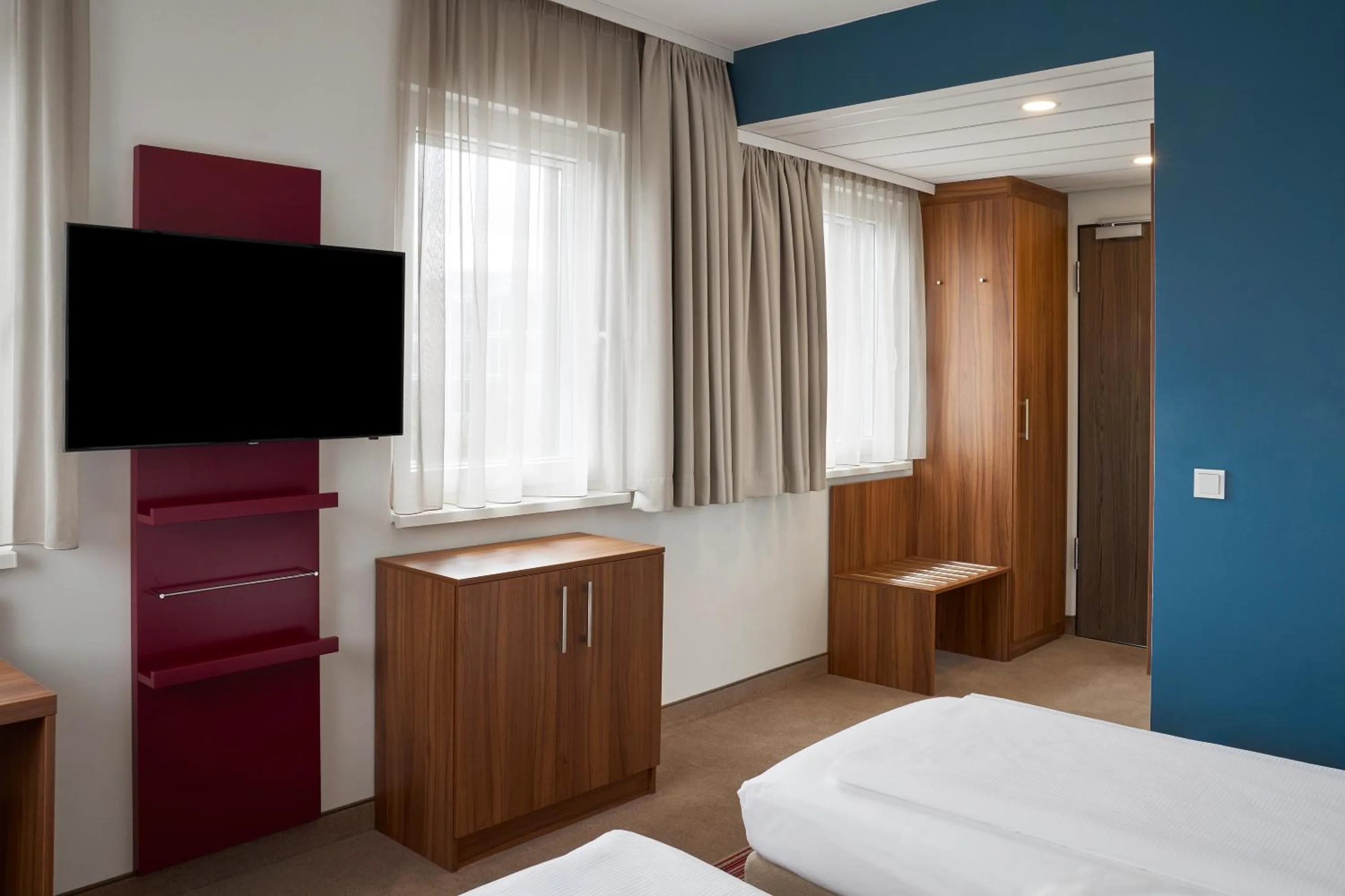 Family Standard King Room with Two King Beds and Street View in Four Points Flex by Sheraton Essen