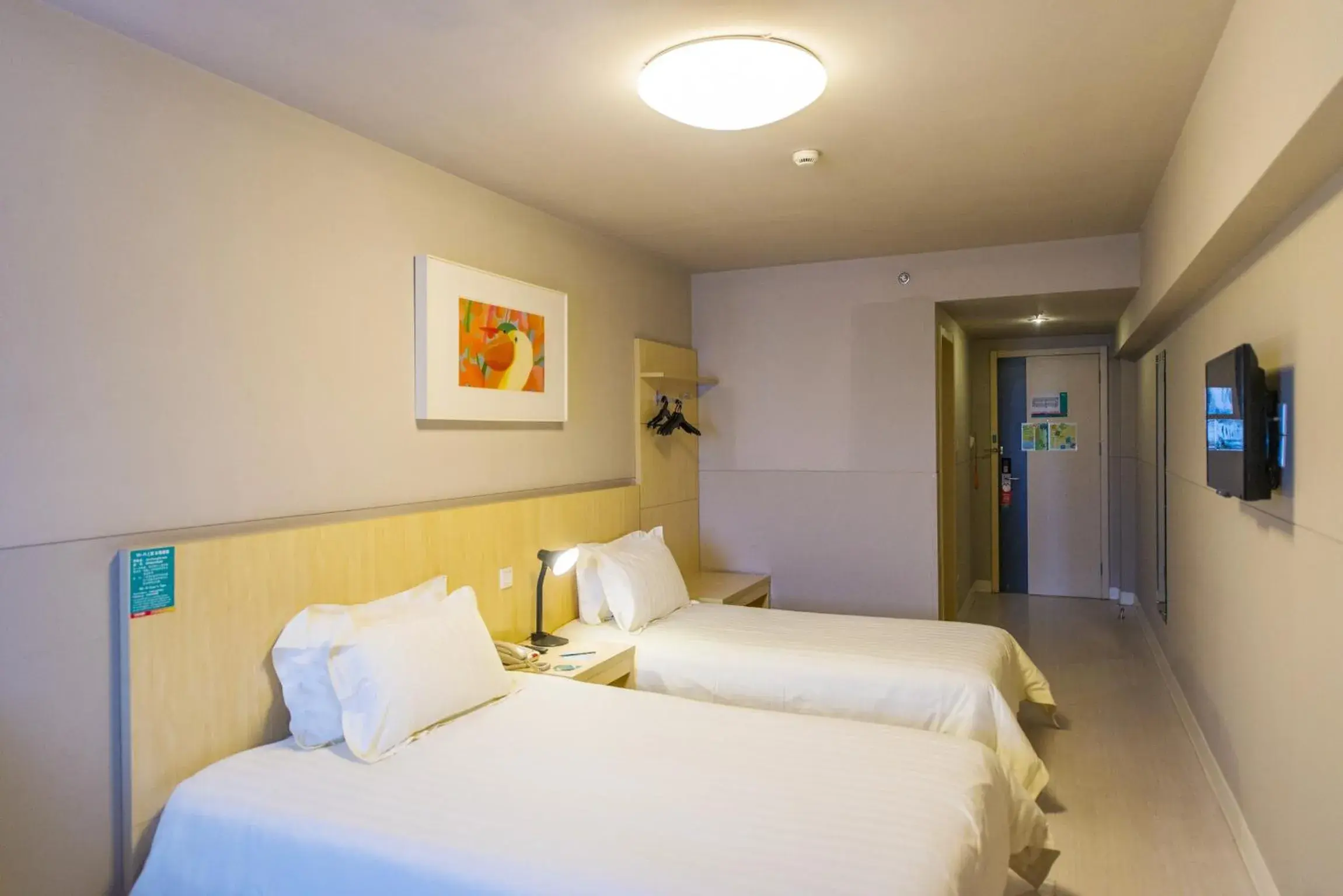 Bedroom, Bed in Jinjiang Inn Changchun Quan’an Square Bedroom, Bed in Jinjiang Inn Changchun Quan’an Square