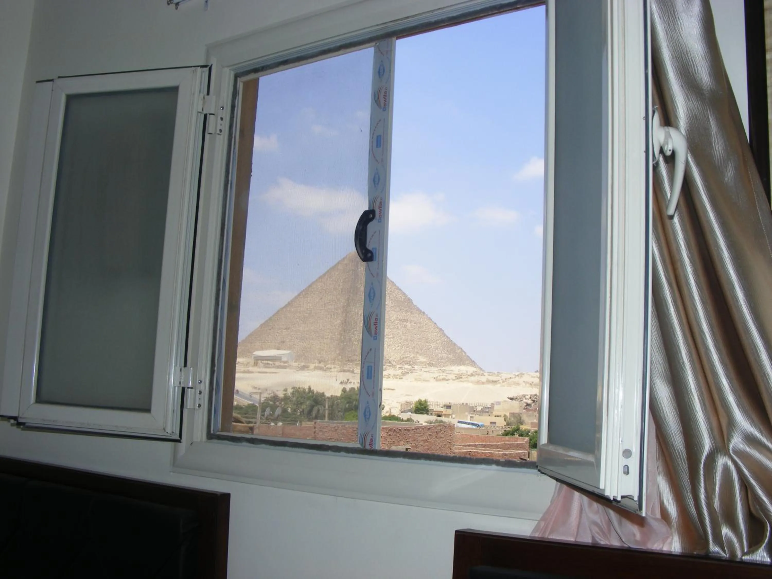 Triple Room with Pyramids View in Best View Pyramids Hotel