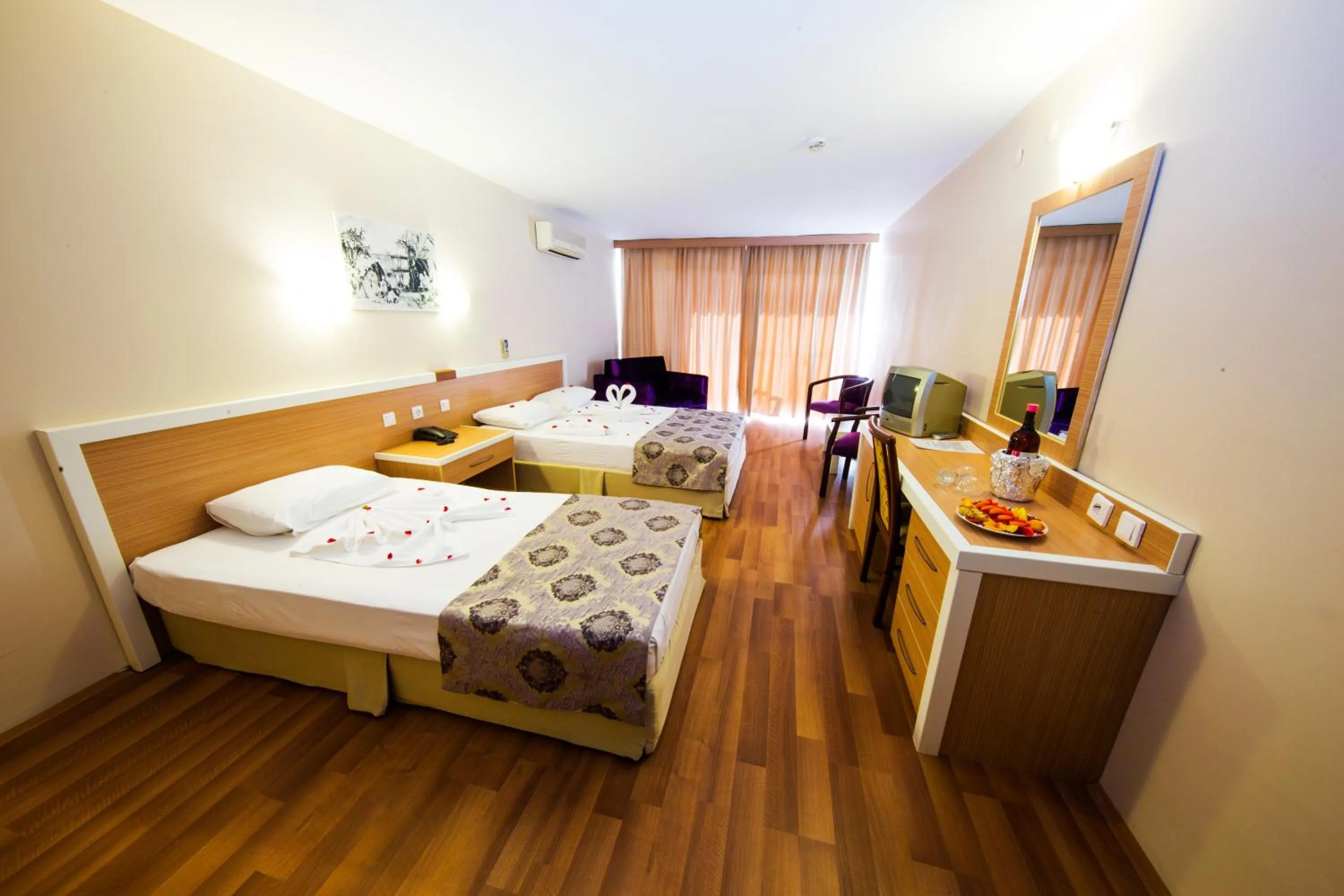 Economy Quadruple Room in Tuntas Beach Hotel - All Inclusive