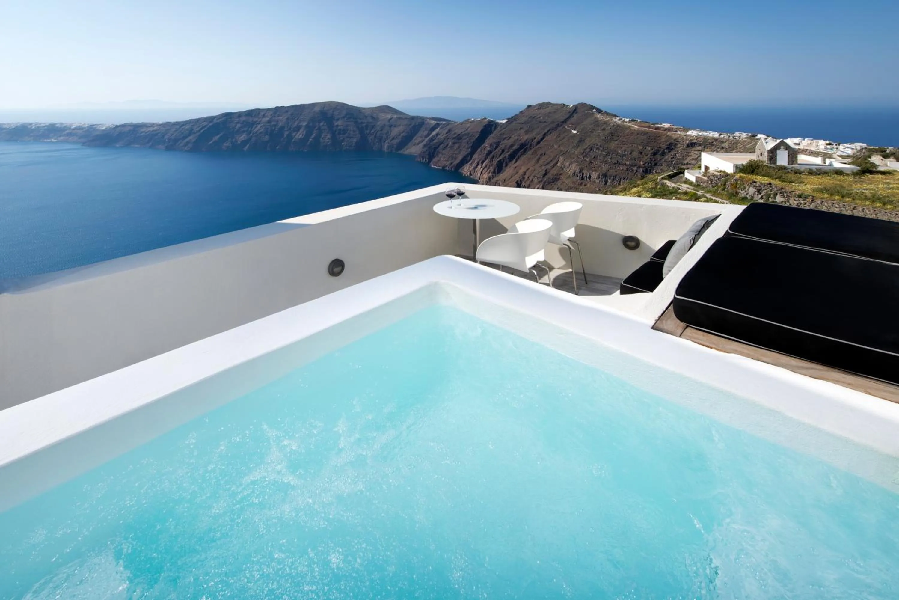 Honeymoon Suite with Outdoor Heated Whirlpool, with Caldera and Sunset view in Avaton Resort And Spa