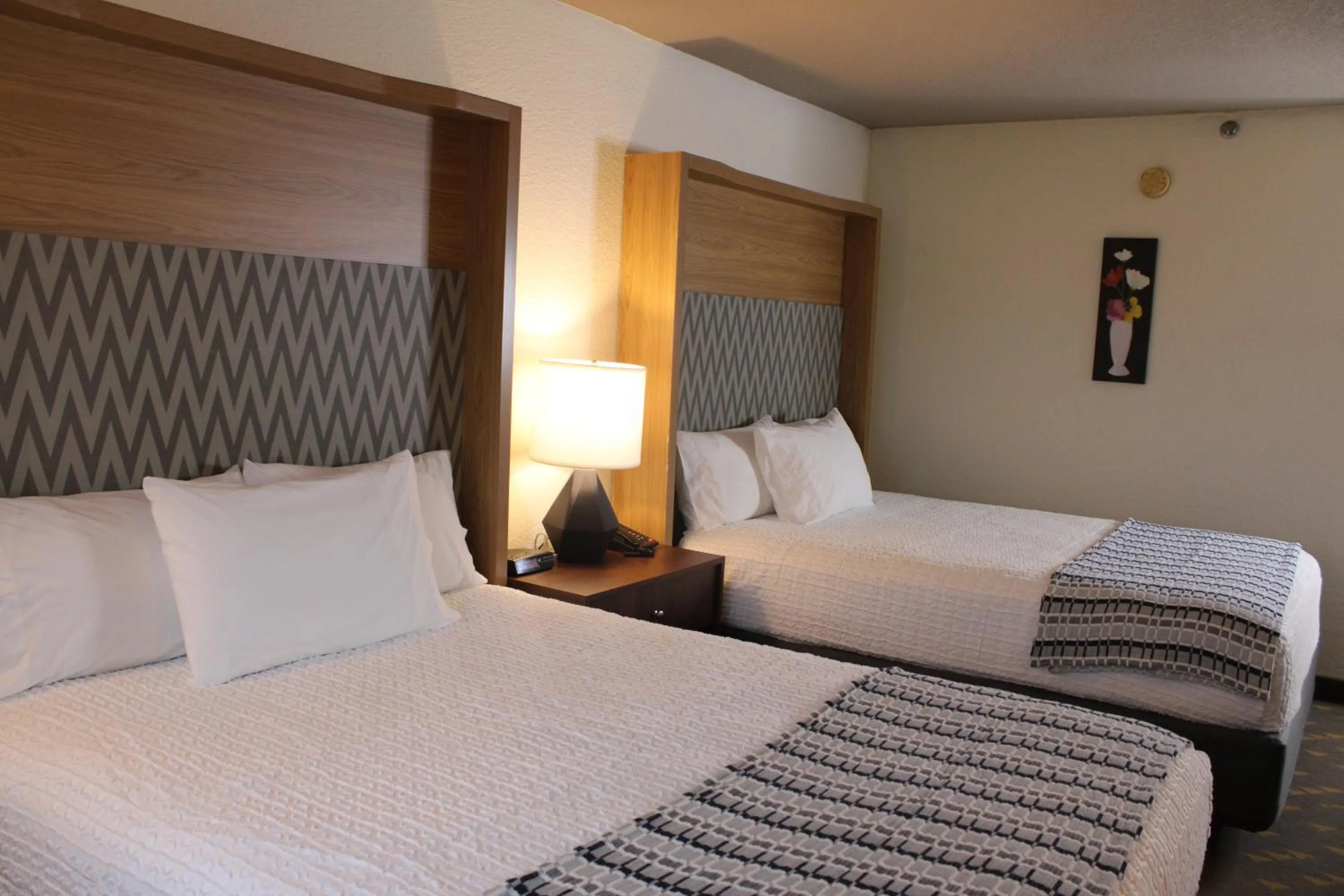 Queen Room with Two Queen Beds and Poolside - Non-Smoking in Wyndham Flint MI Grand Blanc Bishop Airport Conference Ct