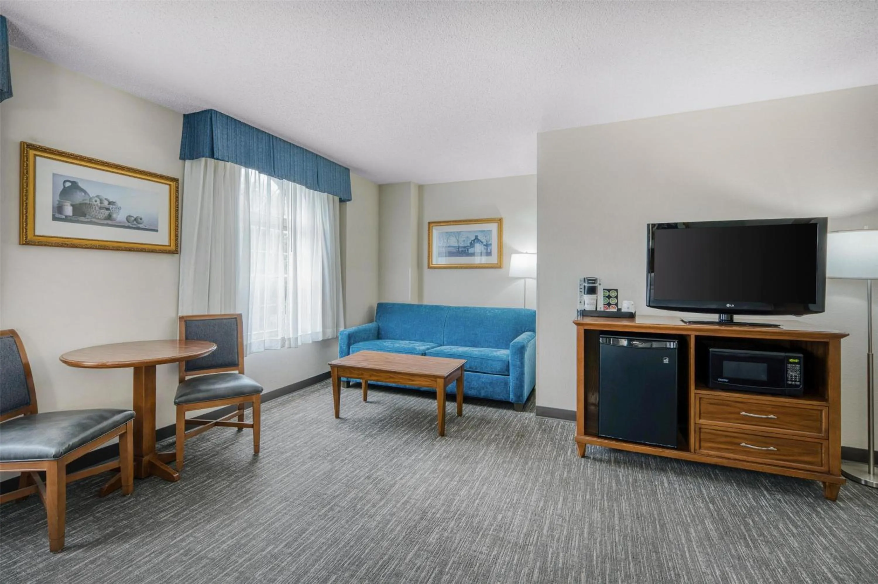 Queen Room with Two Queen Beds with Sofa Bed in SureStay Plus Hotel by Best Western Elizabethtown Hershey