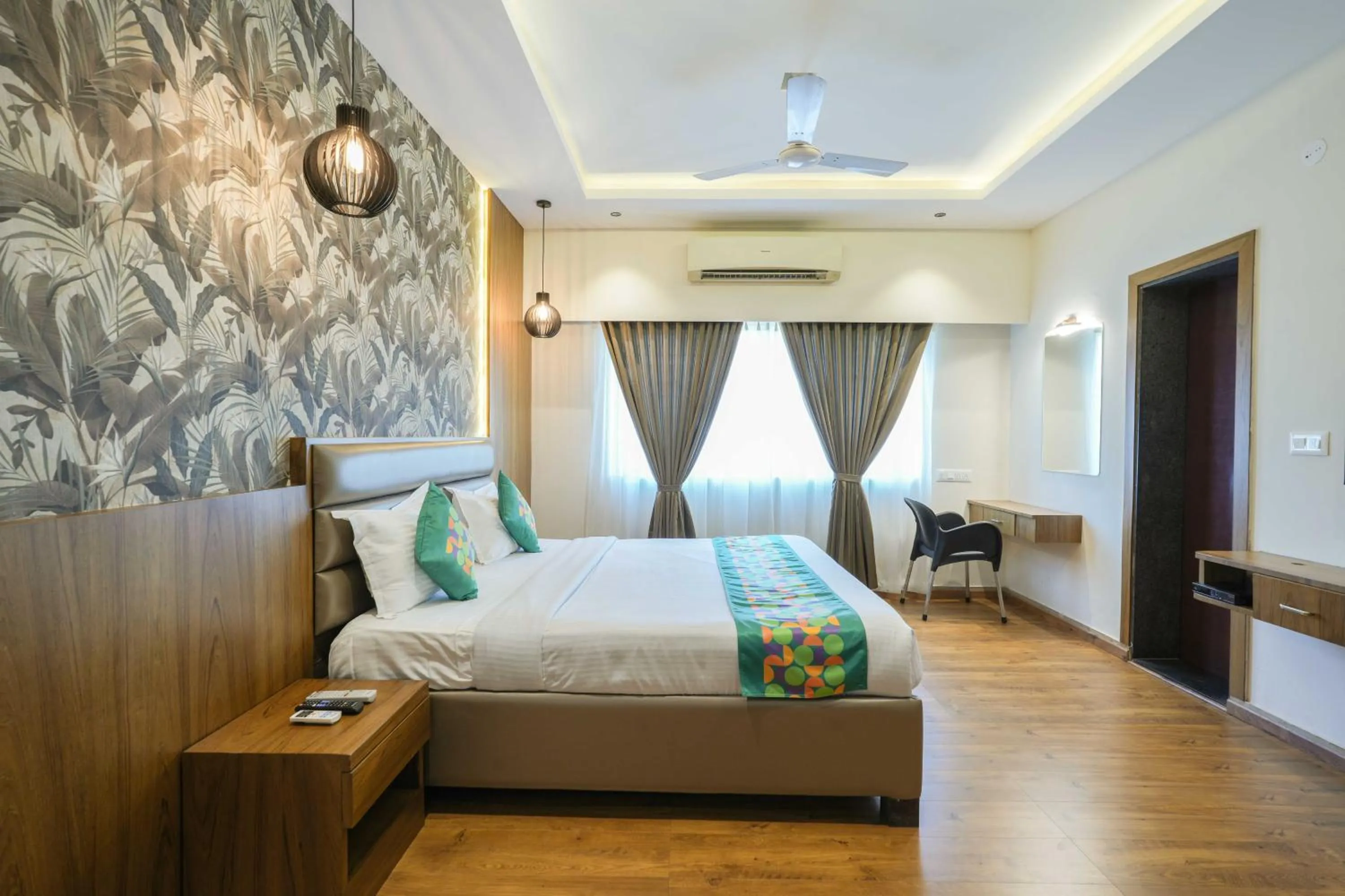 Deluxe Double Room - single occupancy in Treebo Pappilon Palace - PVS Circle