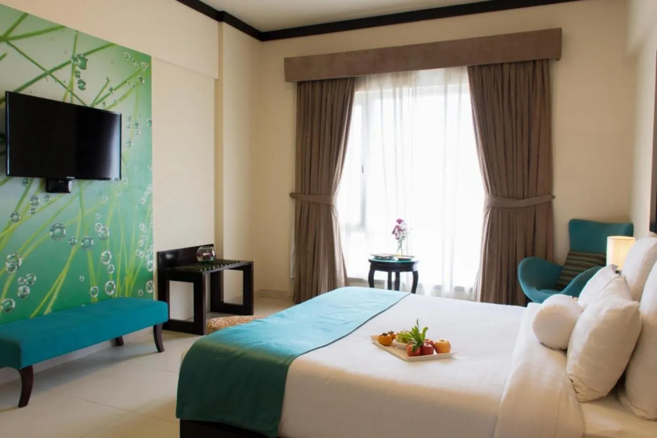 Deluxe King Room - Smoking in Ramada by Wyndham Karachi Creek