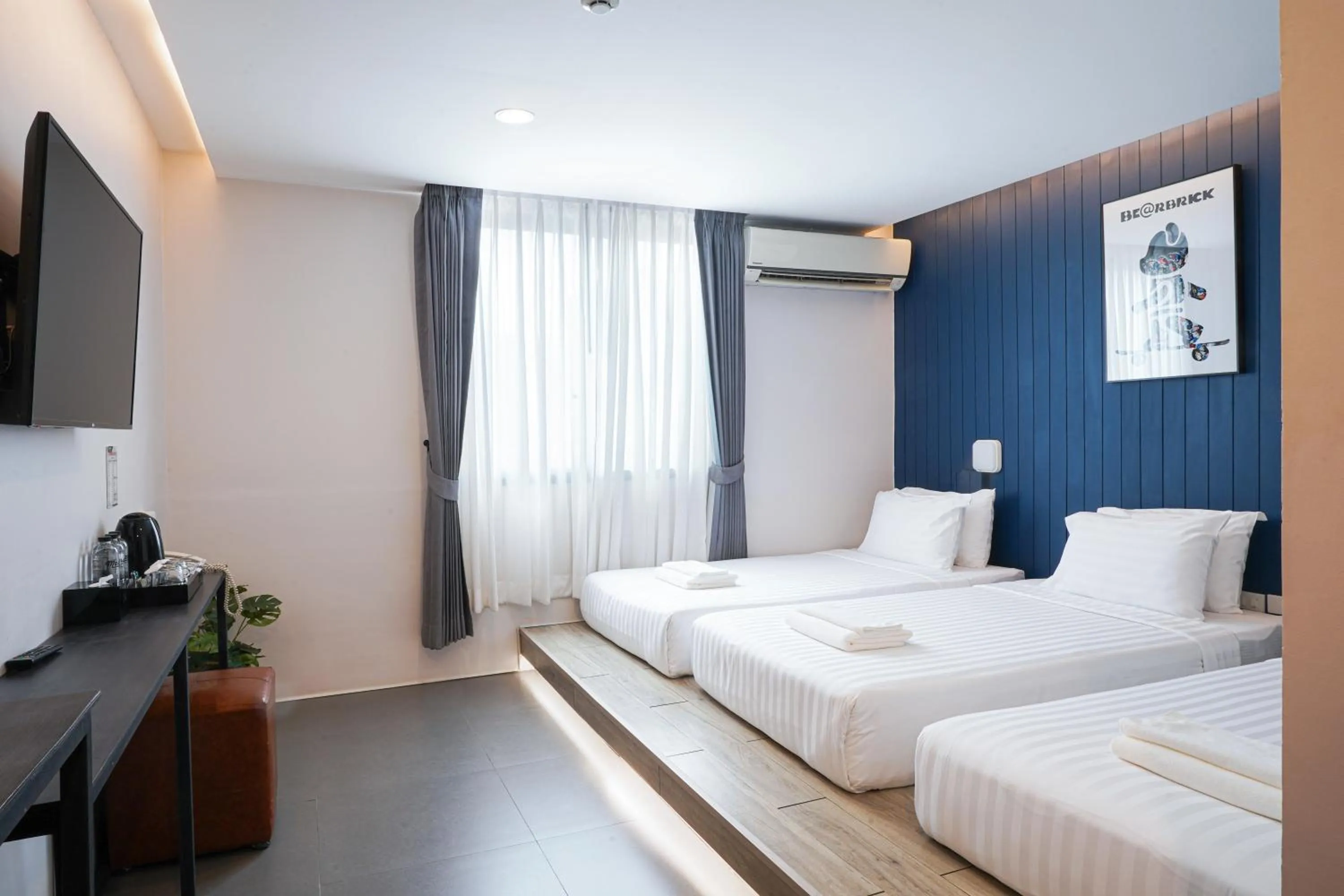 Deluxe Triple Room in Marwin Space