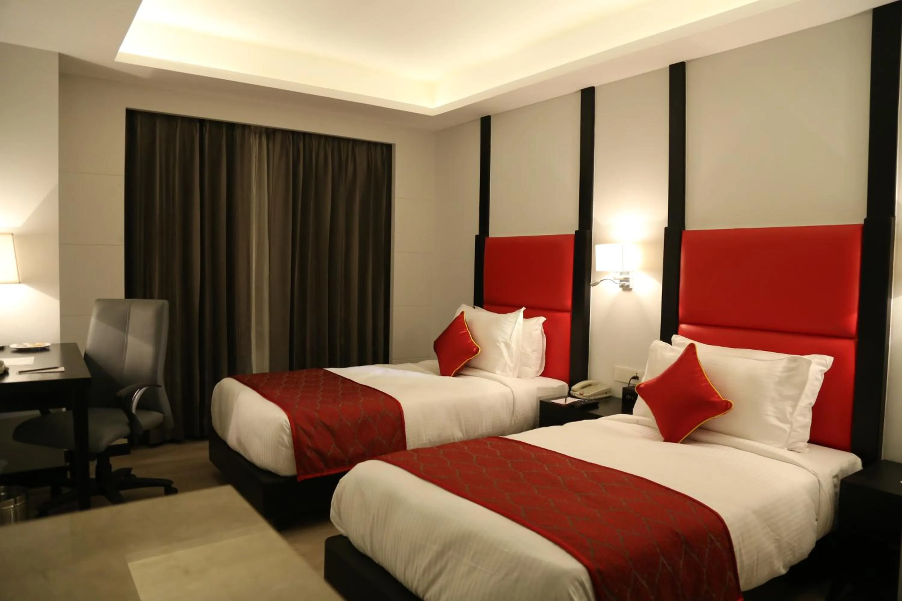 Twin Room - single occupancy - Book & Unlock Exclusive Deals in Ramada Encore Jalandhar