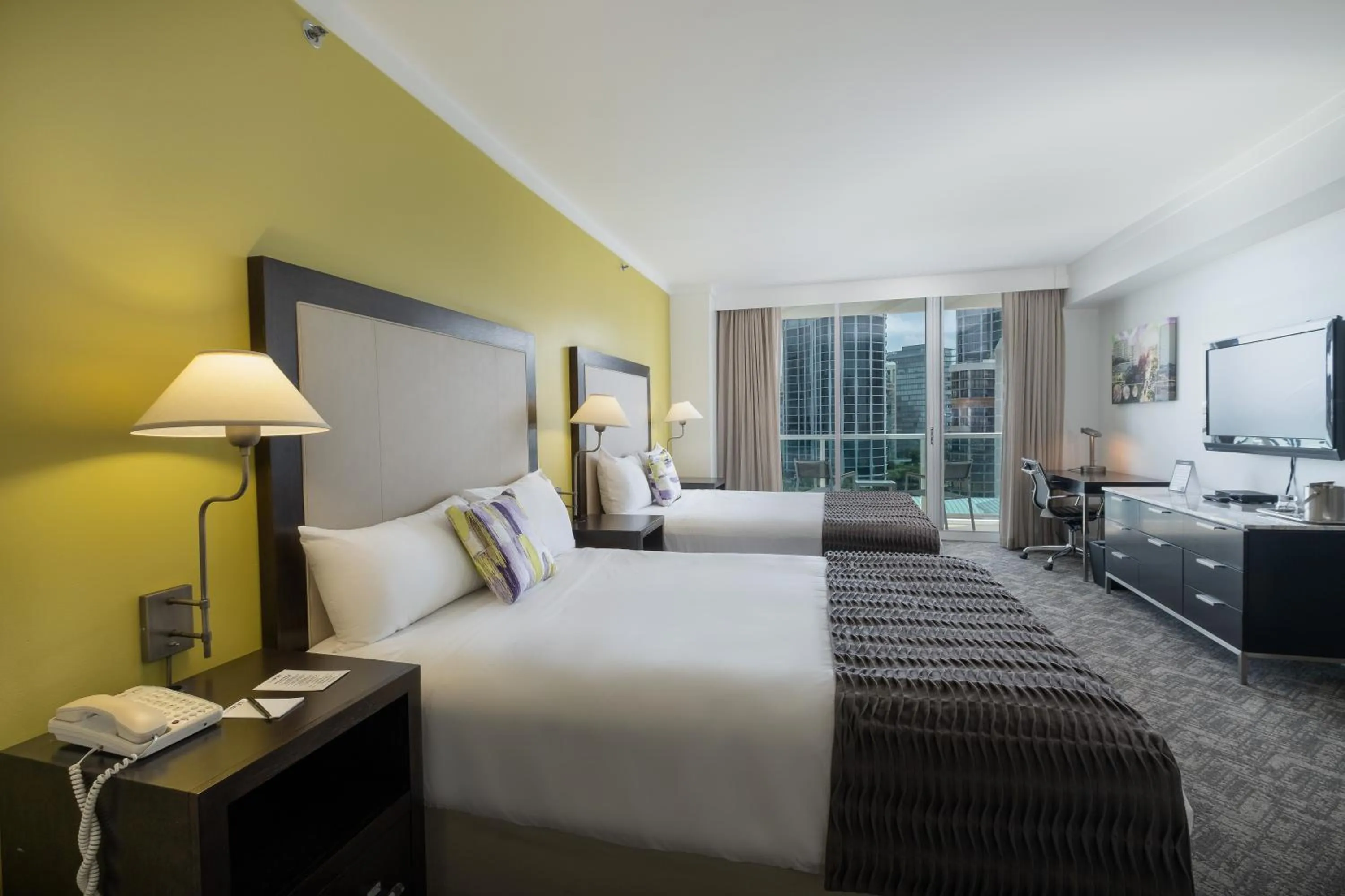 Queen Room with Two Queen Beds and City View in Hotel Arya BW Premier Collection