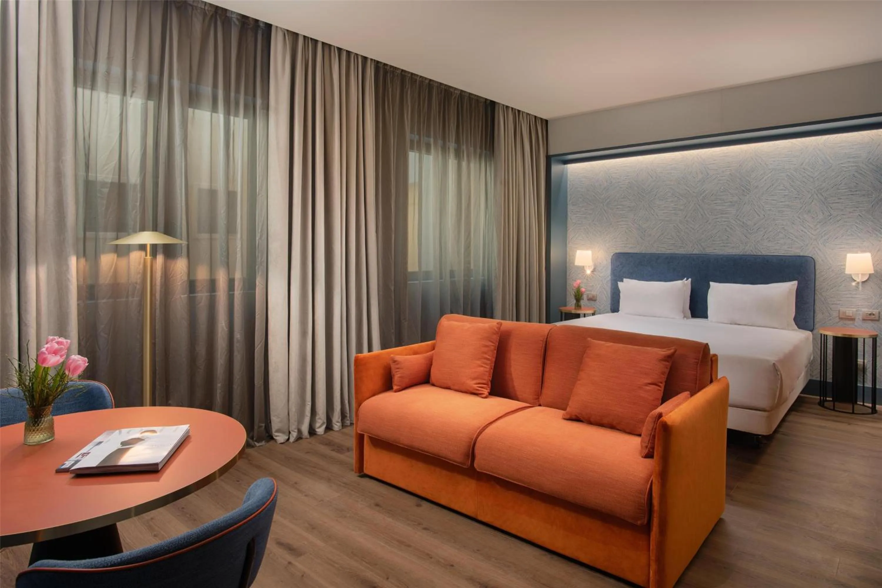 Family Adjoining Room (2 Adults + 2 Children) in NH Firenze