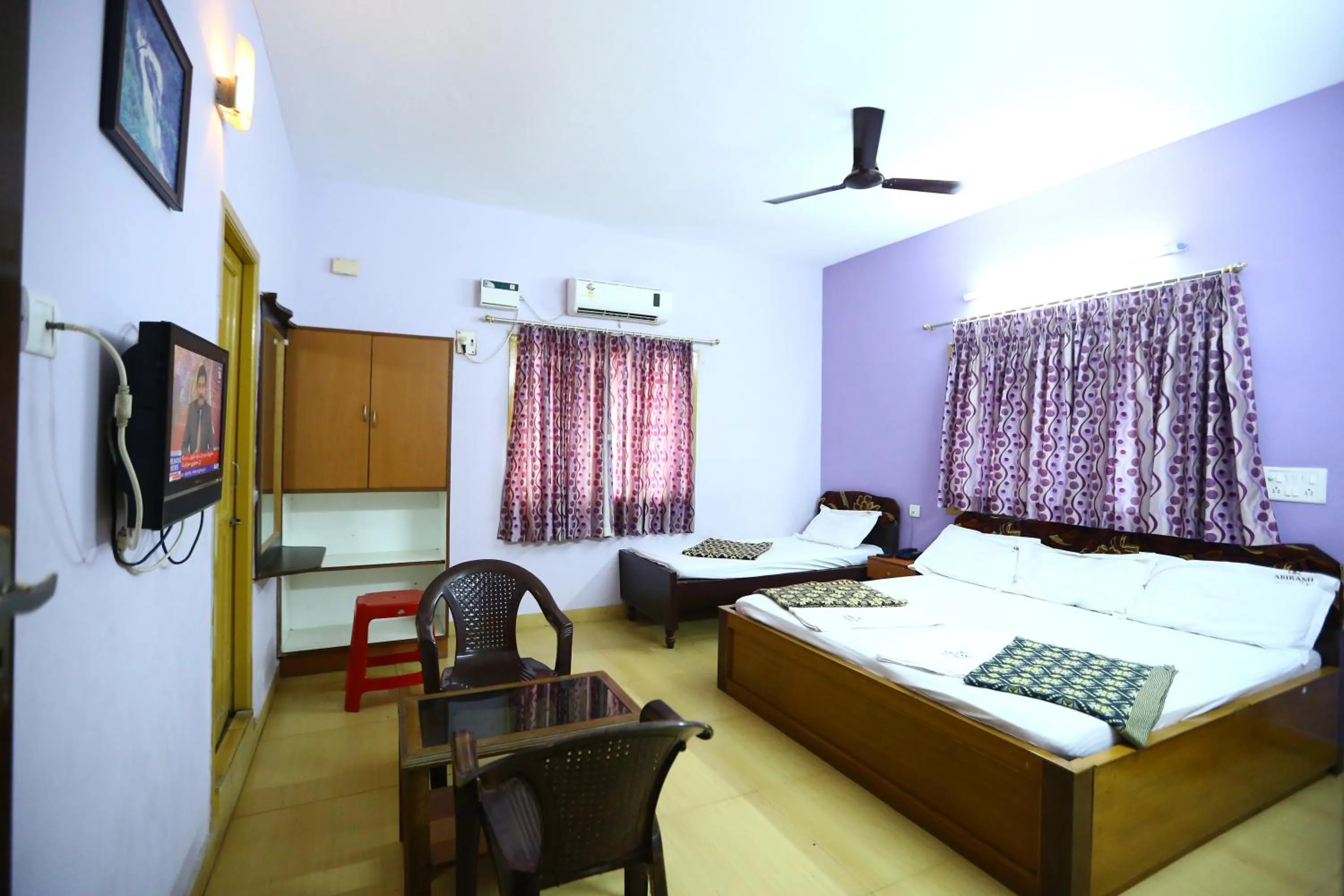 Luxury Triple Room - single occupancy in Abirami Residency